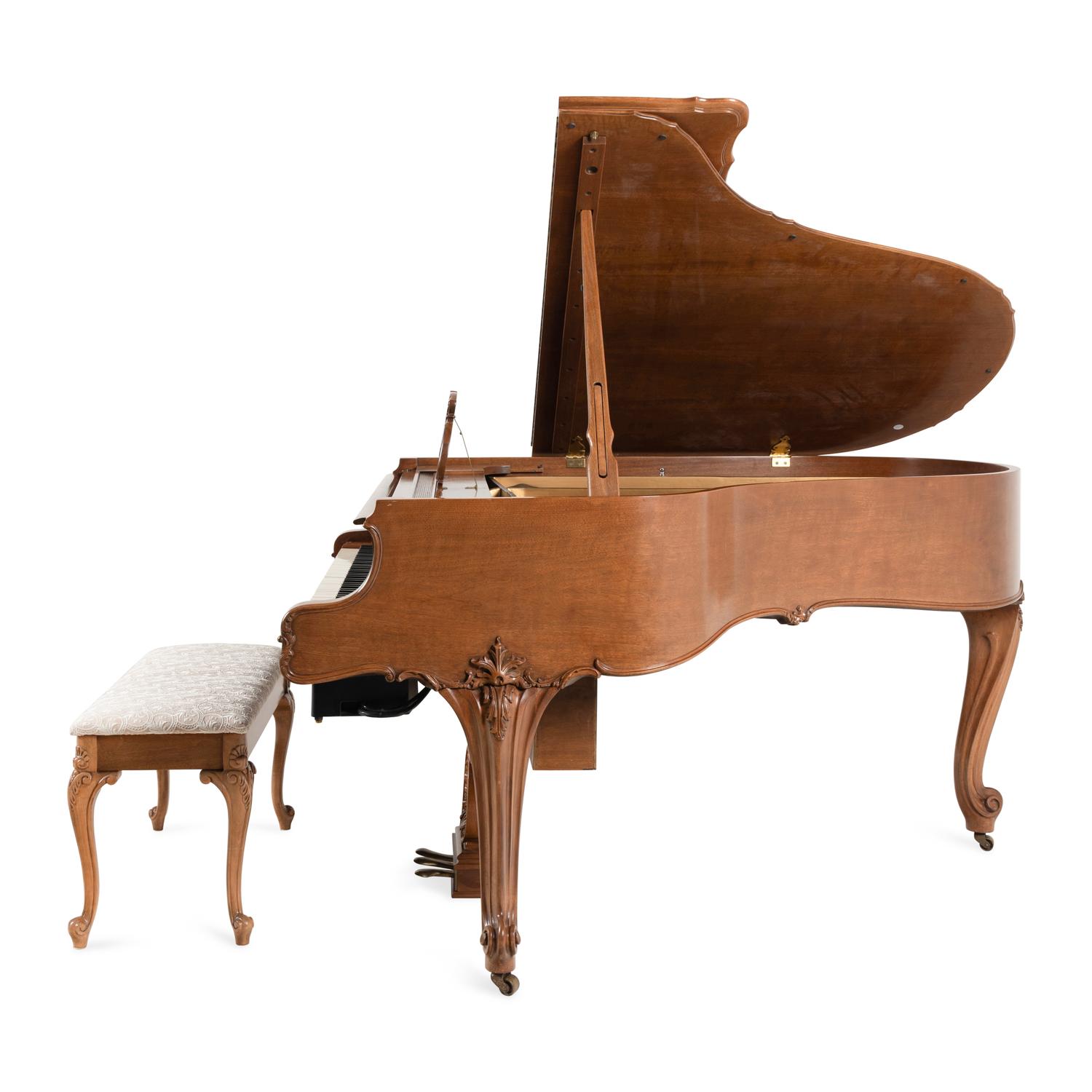 A Steinway and Sons Model M Grand Piano