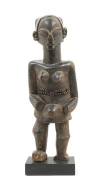 A Luba Wood Female Figure Height 18 3/4 inches. — CONGO, 19TH/20TH CENTURY