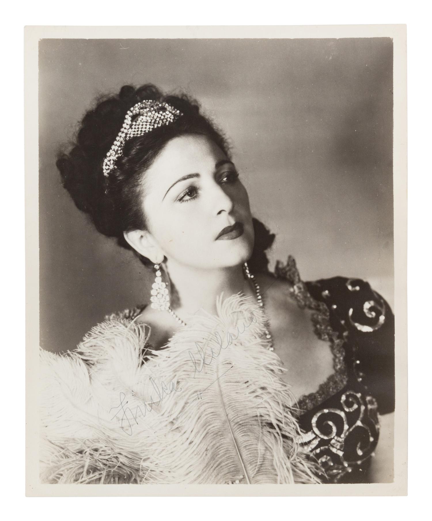 [20TH-CENTURY OPERA SINGERS]. A group of 6 photographs of opera singers from the 1940s, most signed, comprising images of: