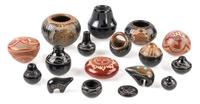 A Group of Seventeen Santa Clara Redware and Blackware Pottery Articles Height of tallest 1 1/2 inches. — Various Makers