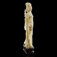 A Chinese carved white jade figure of a meiren 白玉雕美人 19th/early 20th century ????????