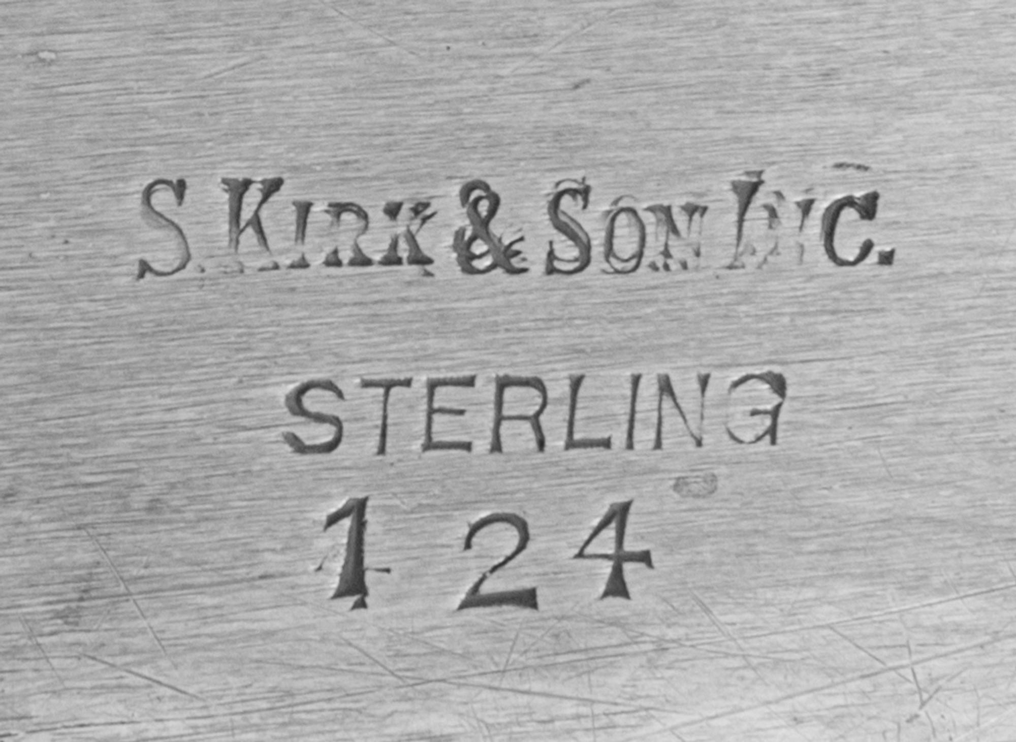 An American Silver Serving Tray, S. Kirk & Son, Baltimore, MD, the twin-handled tray having a repousse floral and foliate border, the f
