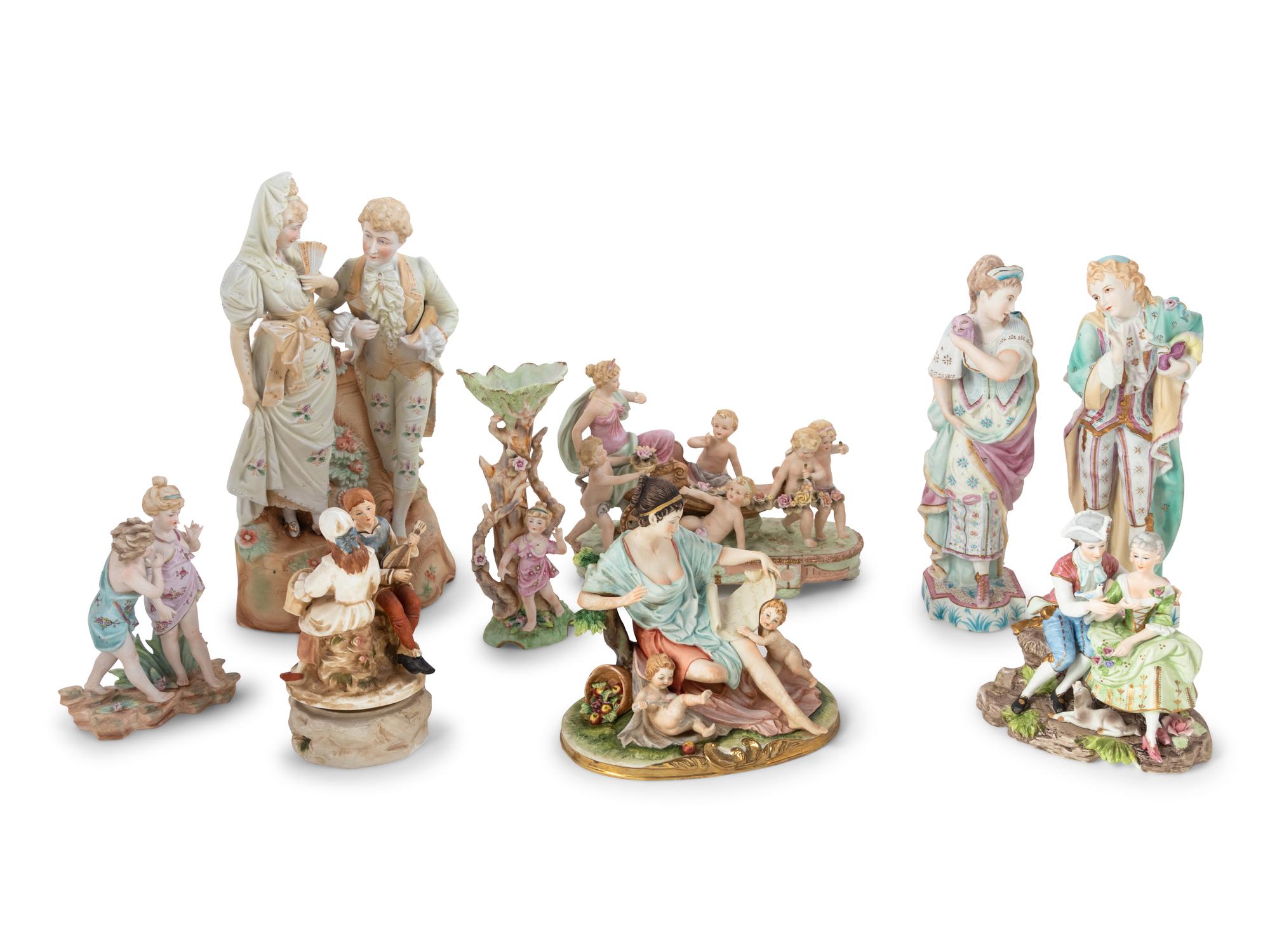 Nine Continental Bisque Porcelain Figures