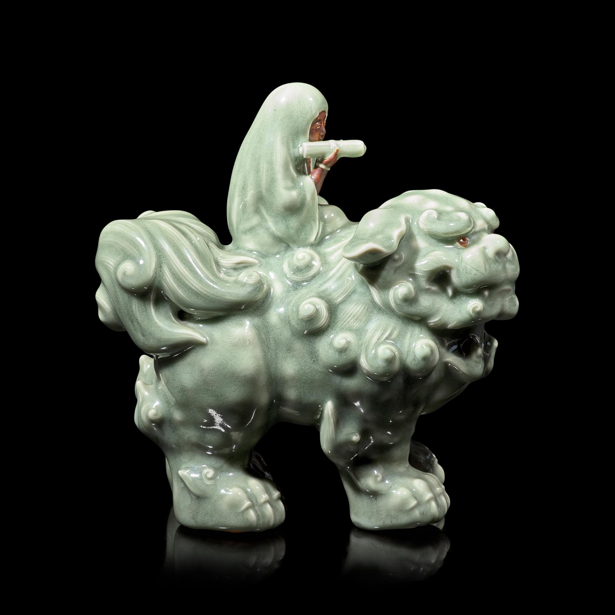 A Japanese Celadon-Glazed Monju on Lion, Impressed Seal Makuzu
