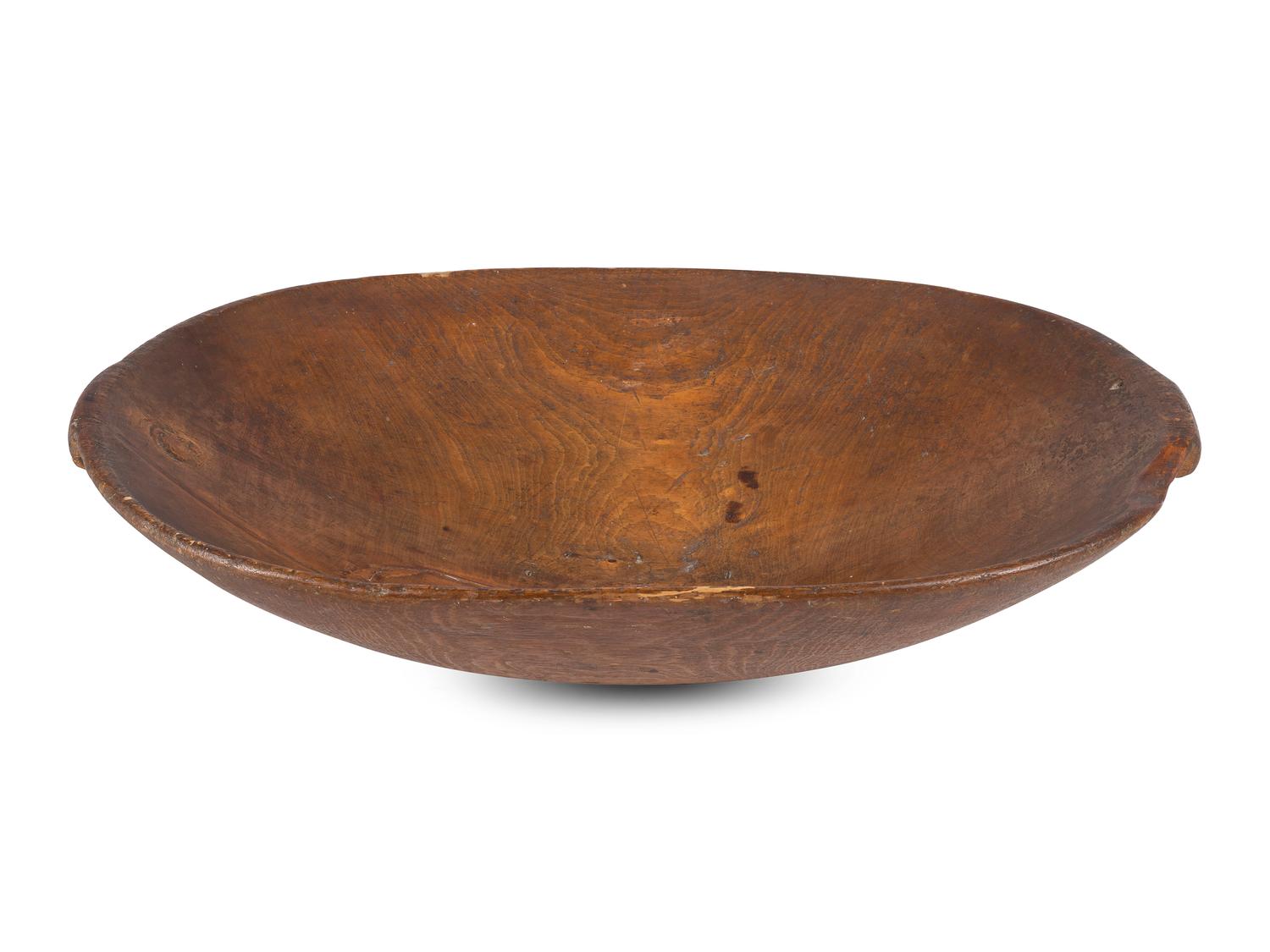 A Carved Wood Dough Bowl