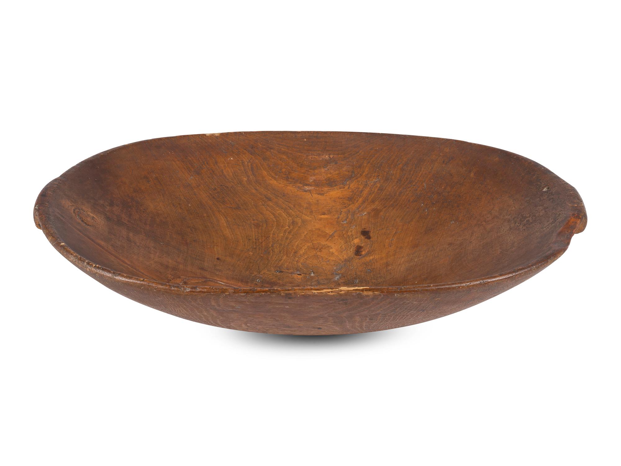 A Carved Wood Dough Bowl