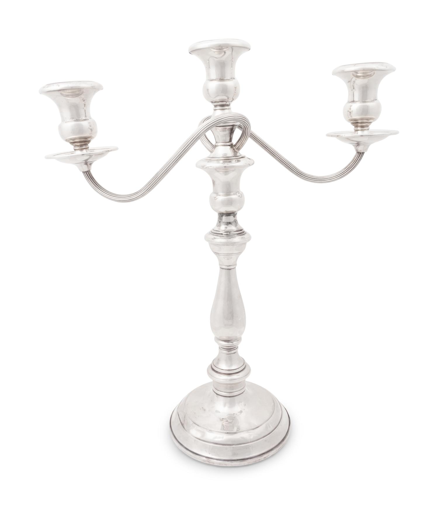 A Group of American Silver Candlesticks and Candelabras