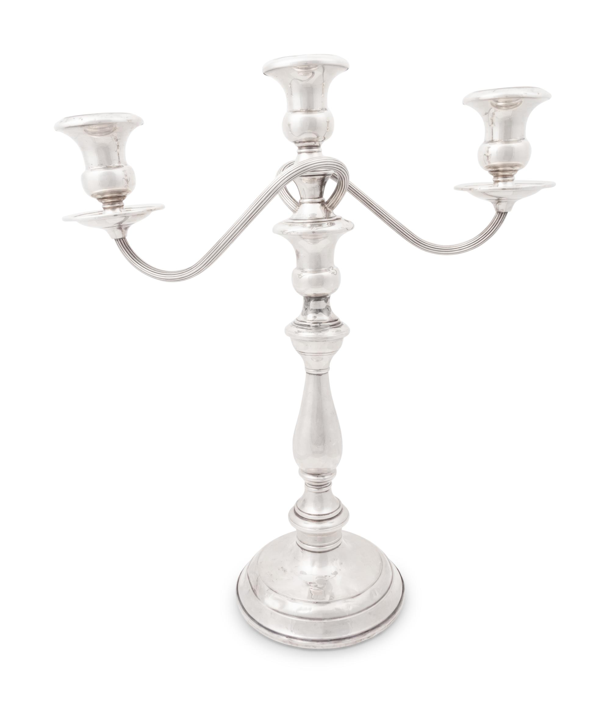 A Group of American Silver Candlesticks and Candelabras