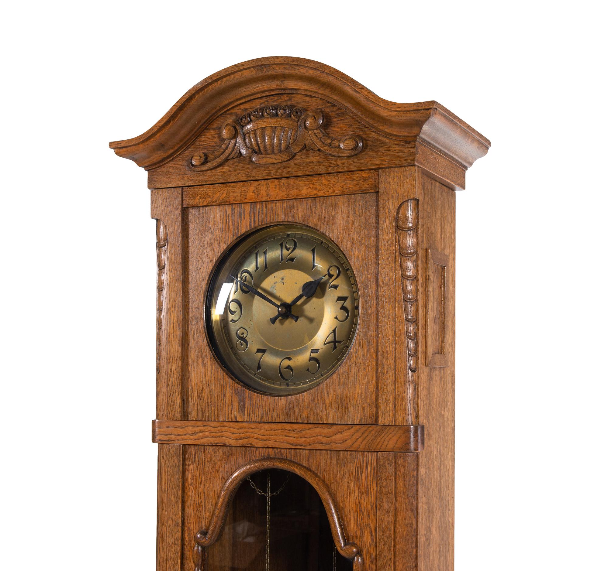A Continental Oak Tall Case Clock