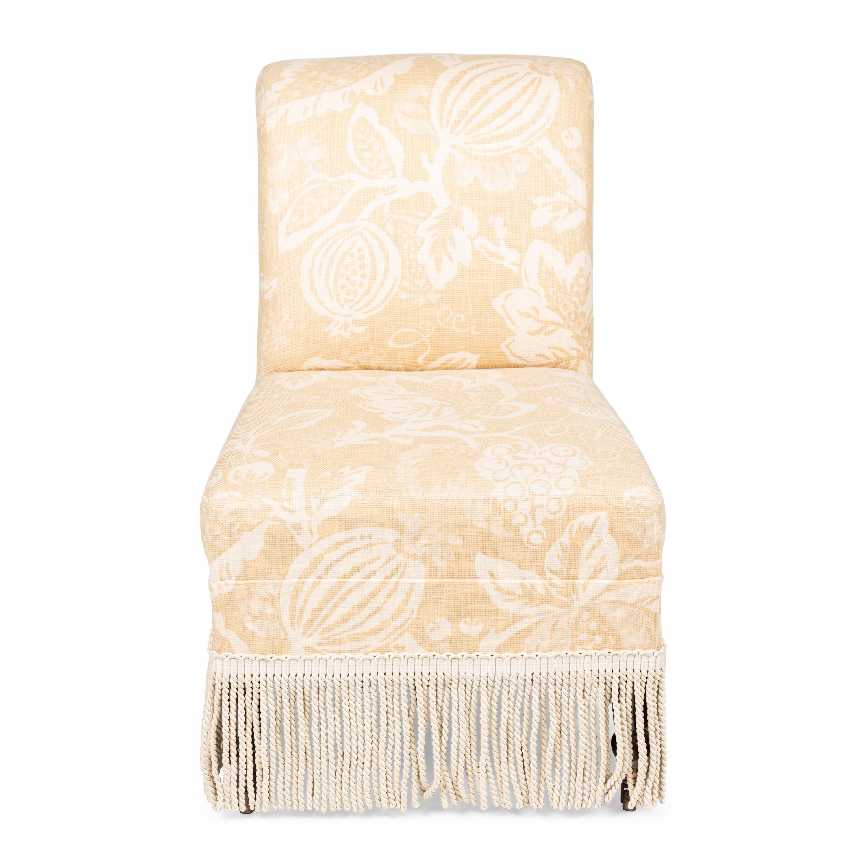 An Upholstered Slipper Chair with Bullion Fringe