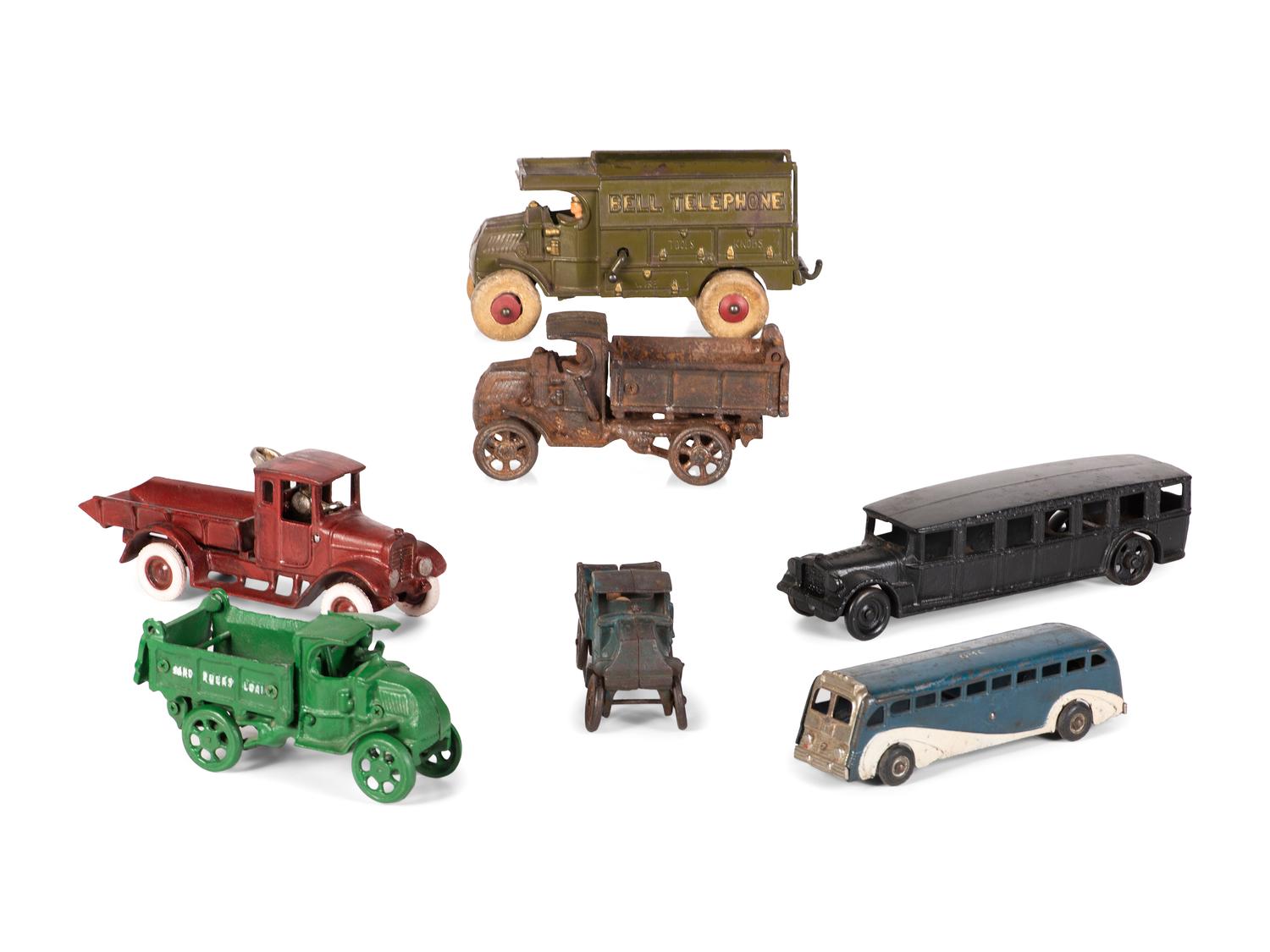 Seven Painted Cast Iron Toy Vehicles