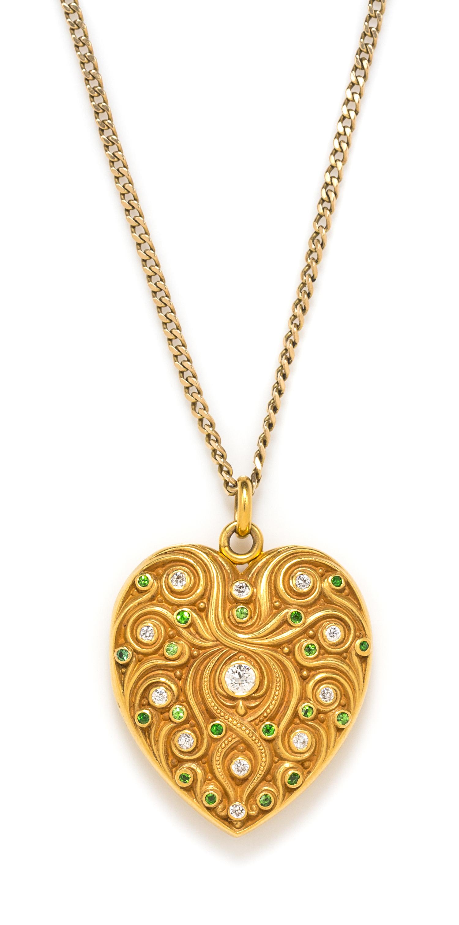 An Art Nouveau 14 Karat Yellow Gold, Diamond and Demantoid Garnet Heart Shaped Locket, Carter, Gough & Co., 19.40 dwts.