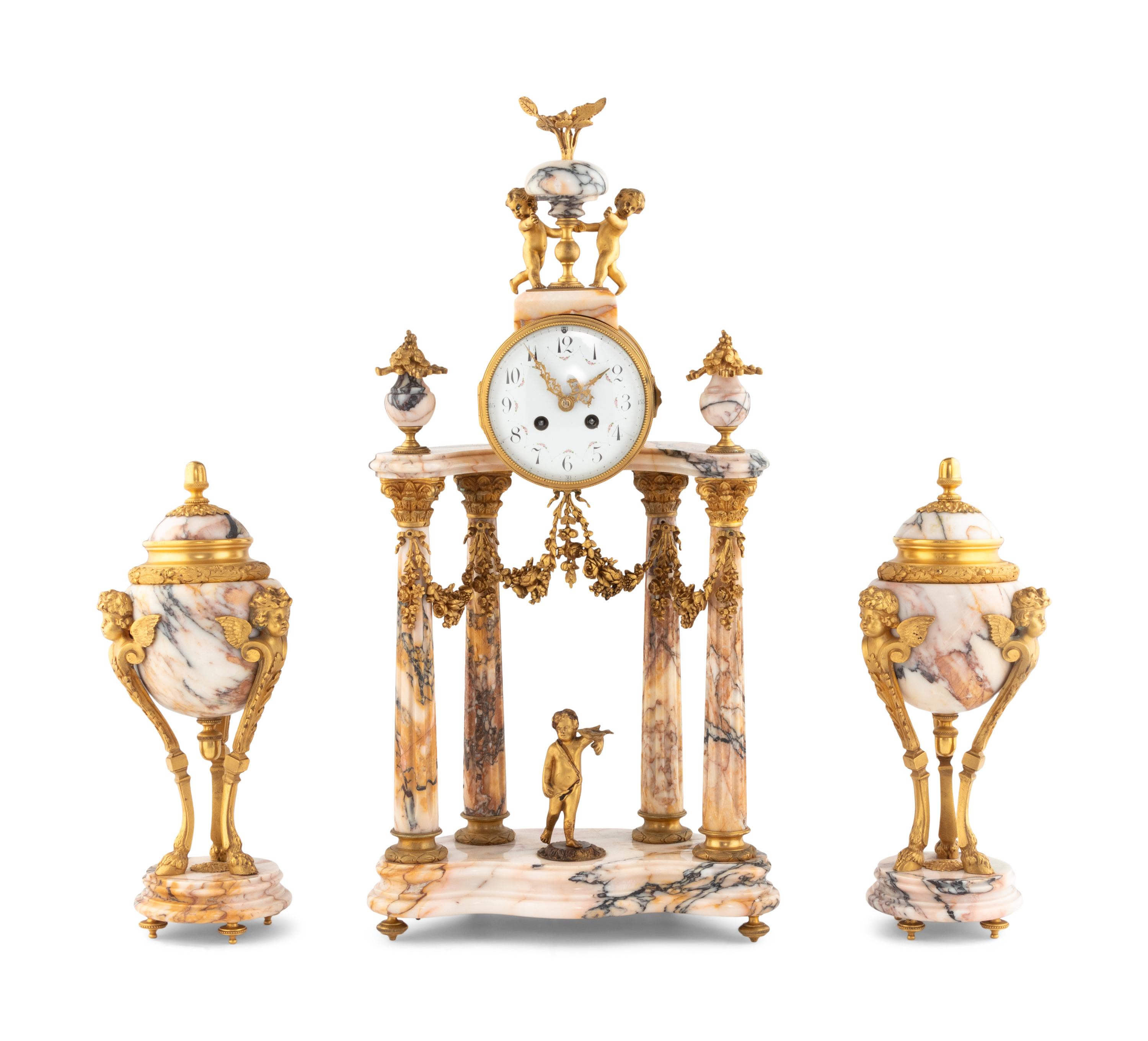 A French Gilt Bronze and Marble Mantel Clock Garniture