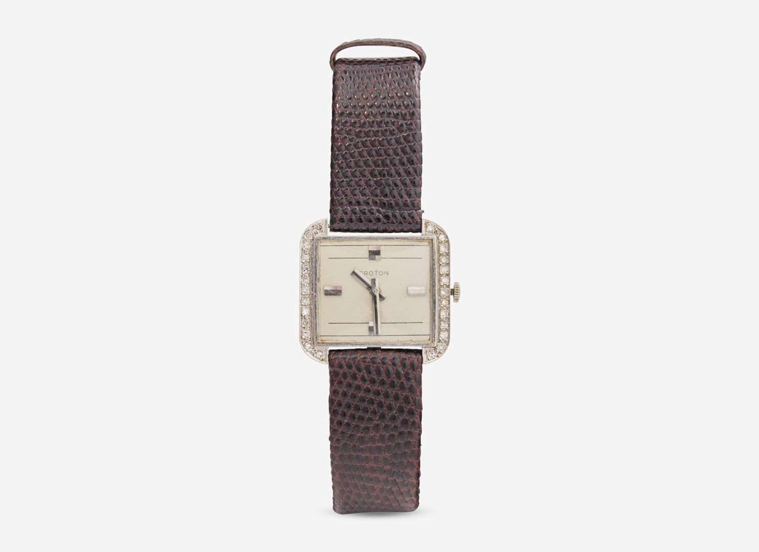 A Ladies 14K White Gold and Diamond Croton Watch