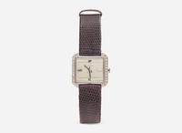 A Ladies 14K White Gold and Diamond Croton Watch