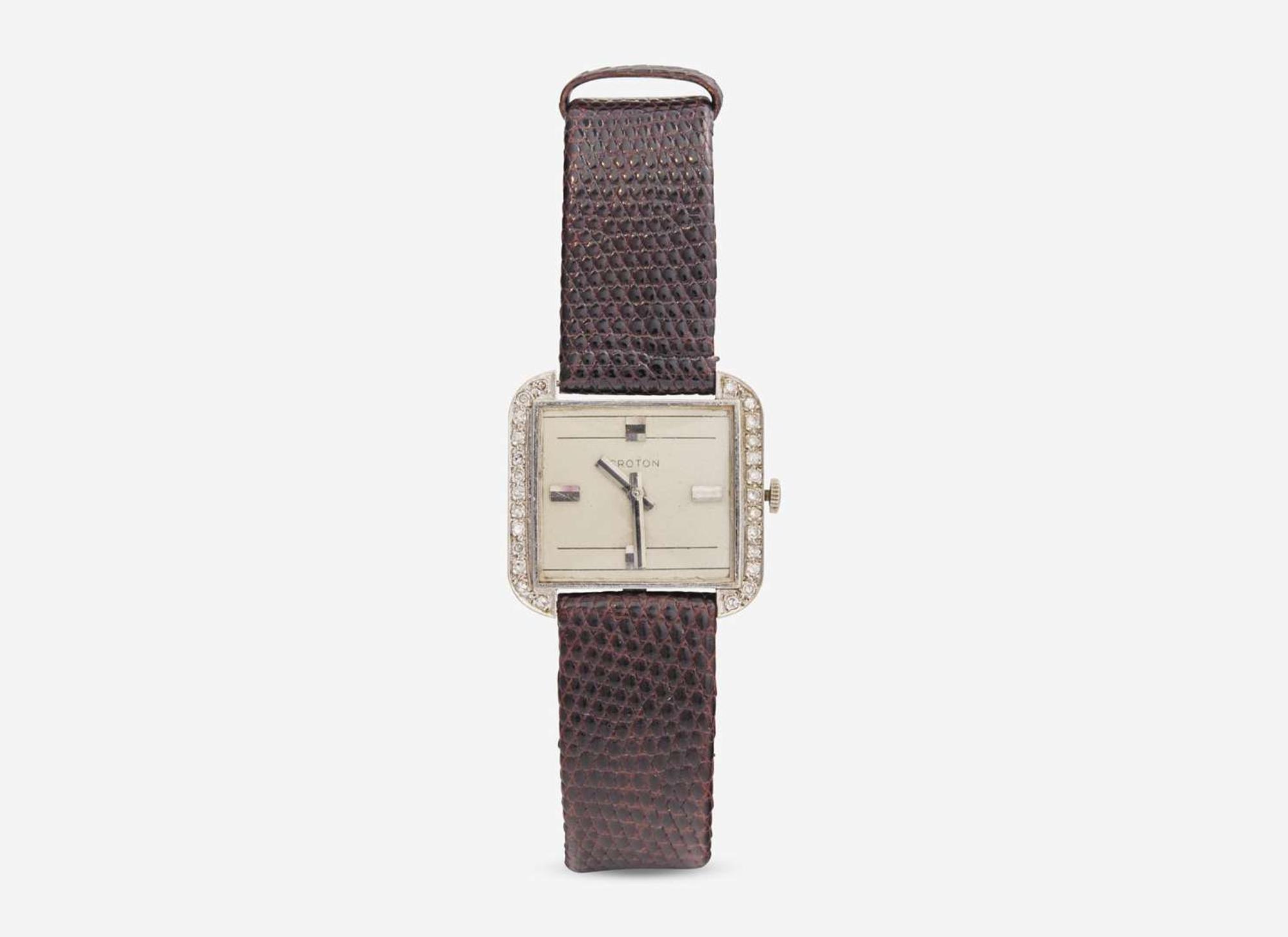 A Ladies 14K White Gold and Diamond Croton Watch