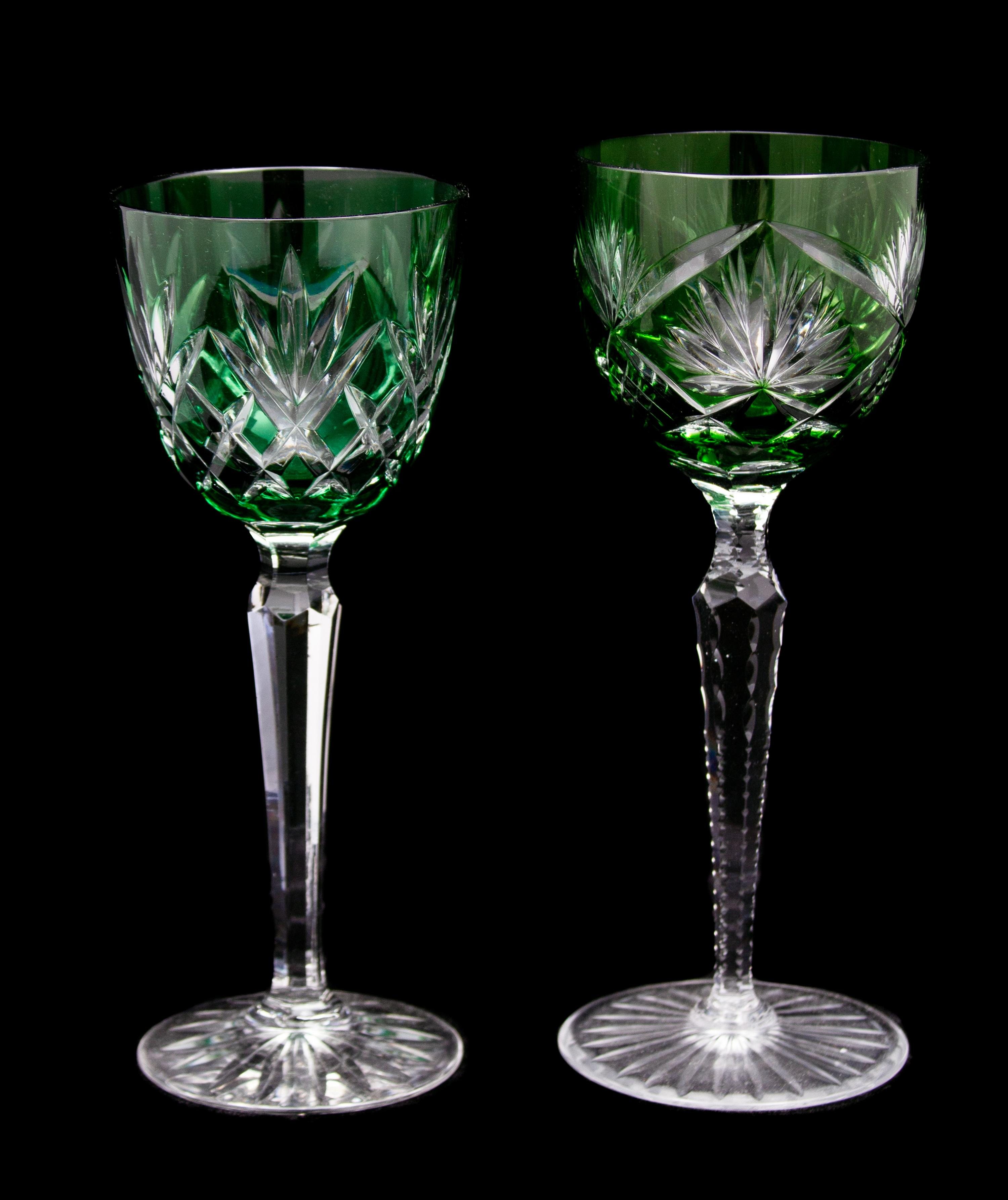 Twelve Bohemian Green-Cut-to-Clear Crystal Stemmed Wines Height of taller three 8 1/4 inches. — EARLY 20TH CENTURY