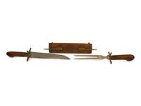 An Indian Carved Hardwood and Brass Dagger and Display Sheath