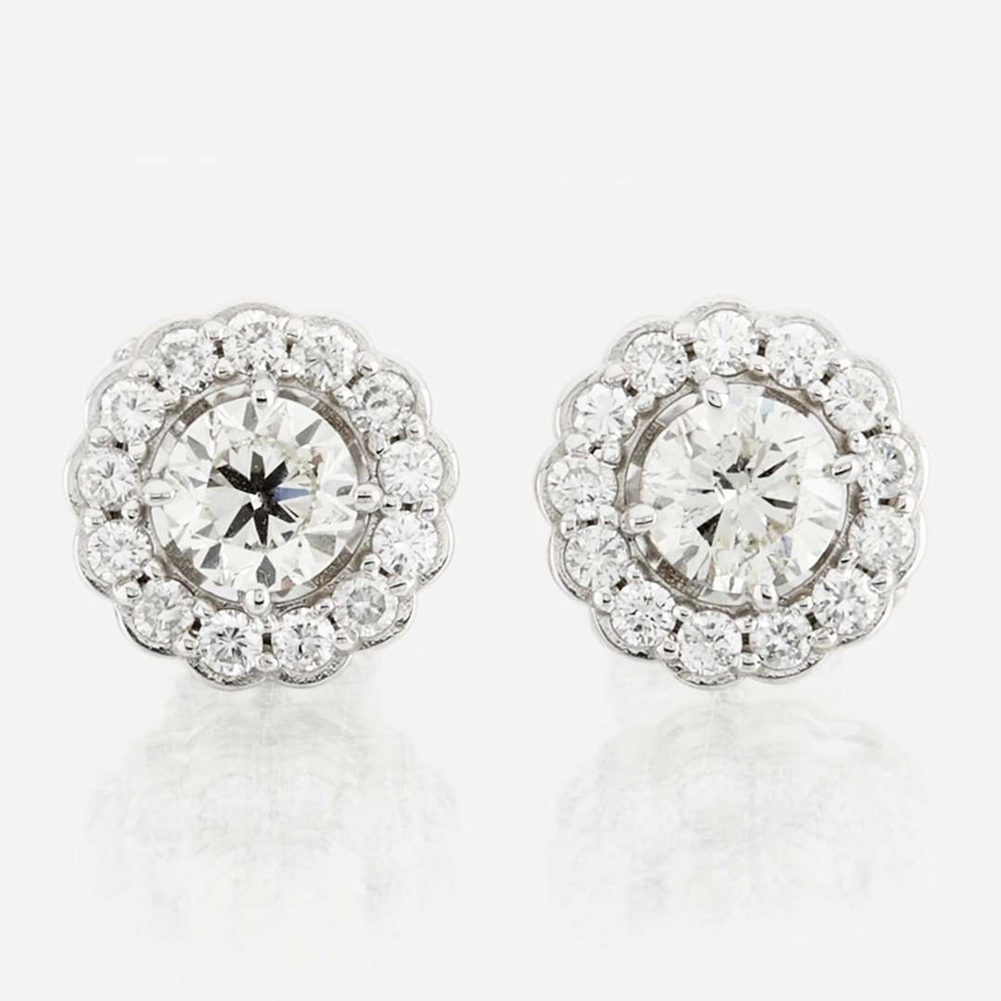 A pair of diamond and white gold earrings