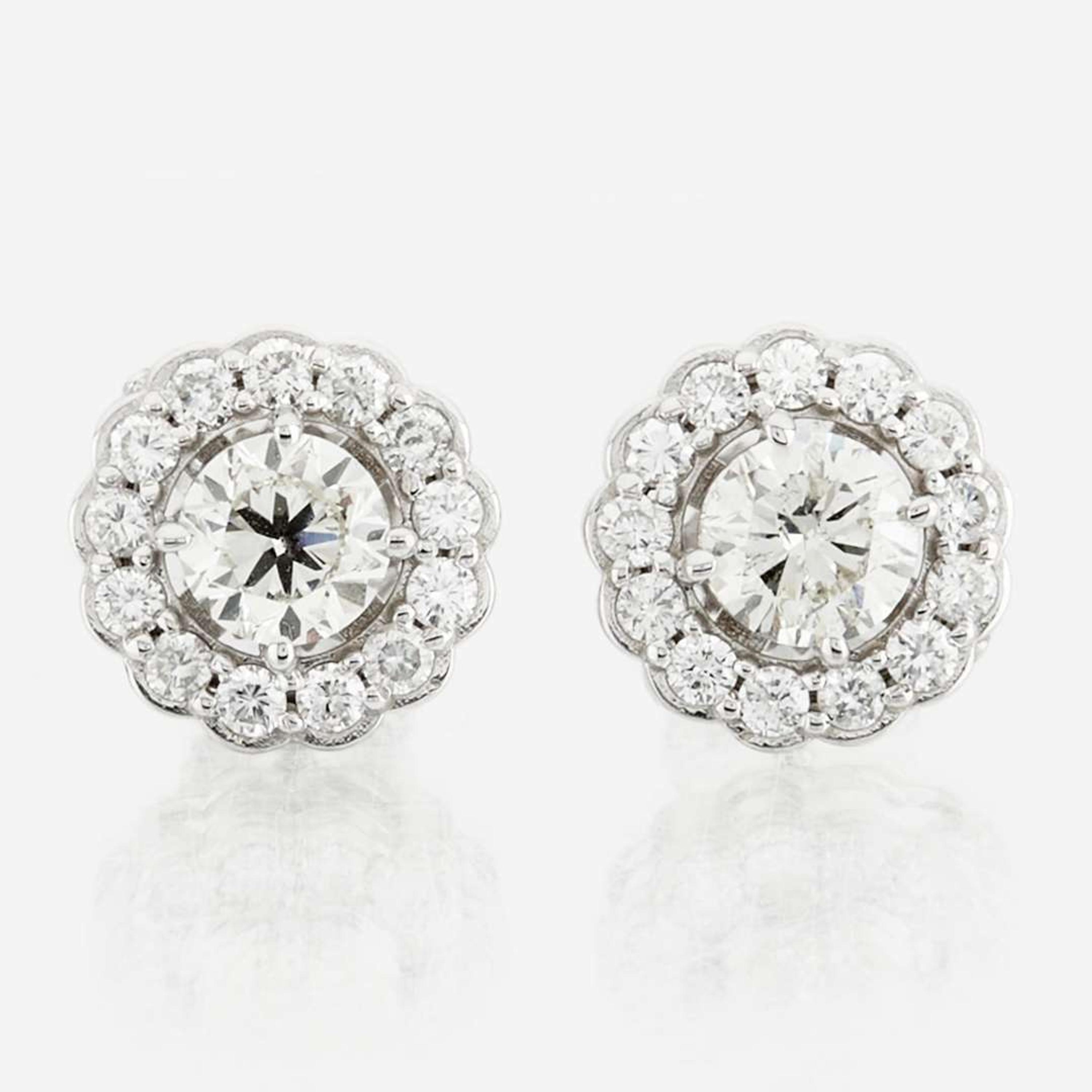 A pair of diamond and white gold earrings
