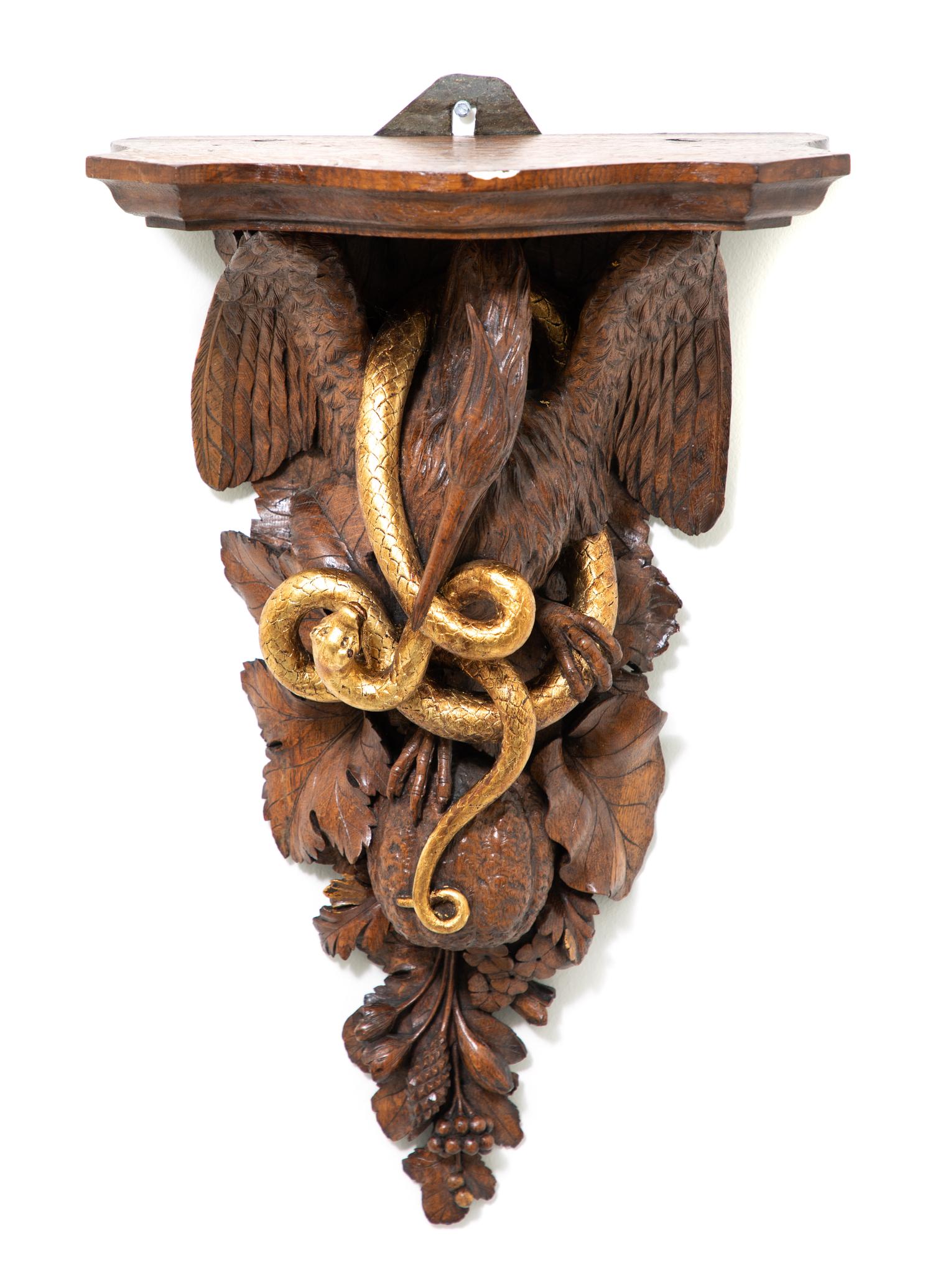 A Continental Carved and Parcel Gilt Wall Bracket Height 24 1/2 inches. — 19TH CENTURY