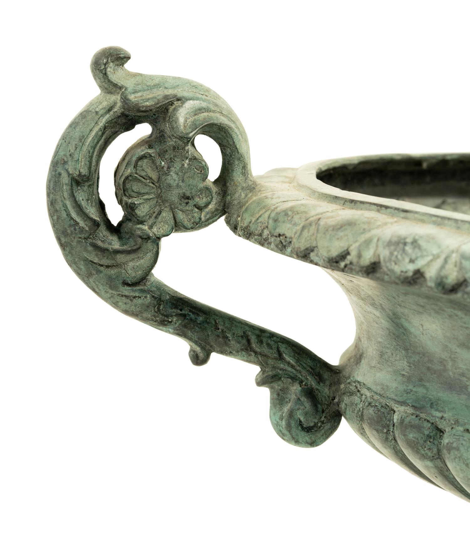 A Patinated Cast Metal Garden Urn