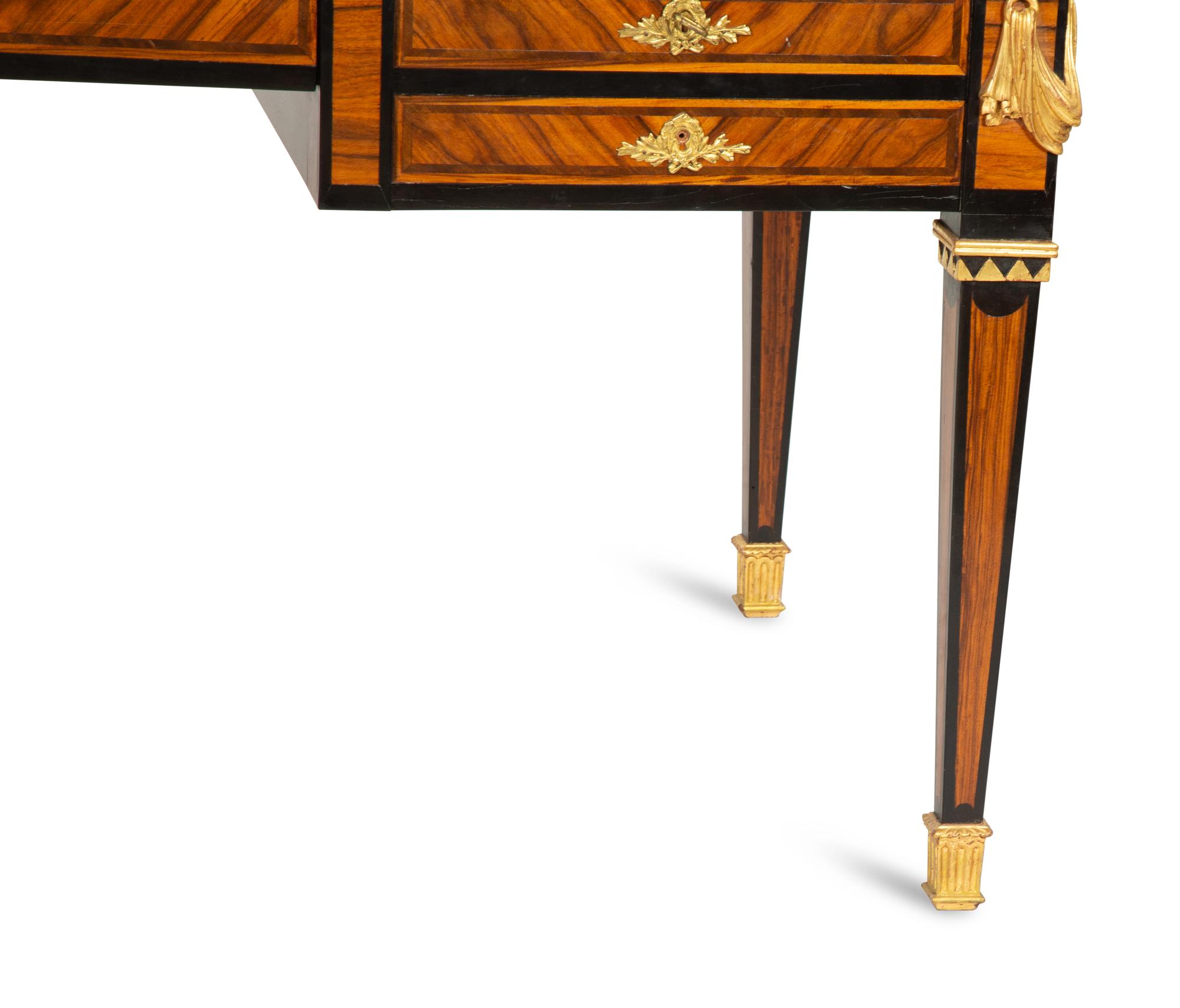 An Empire Style Cross Banded Walnut and Ebonized Bureau Plat