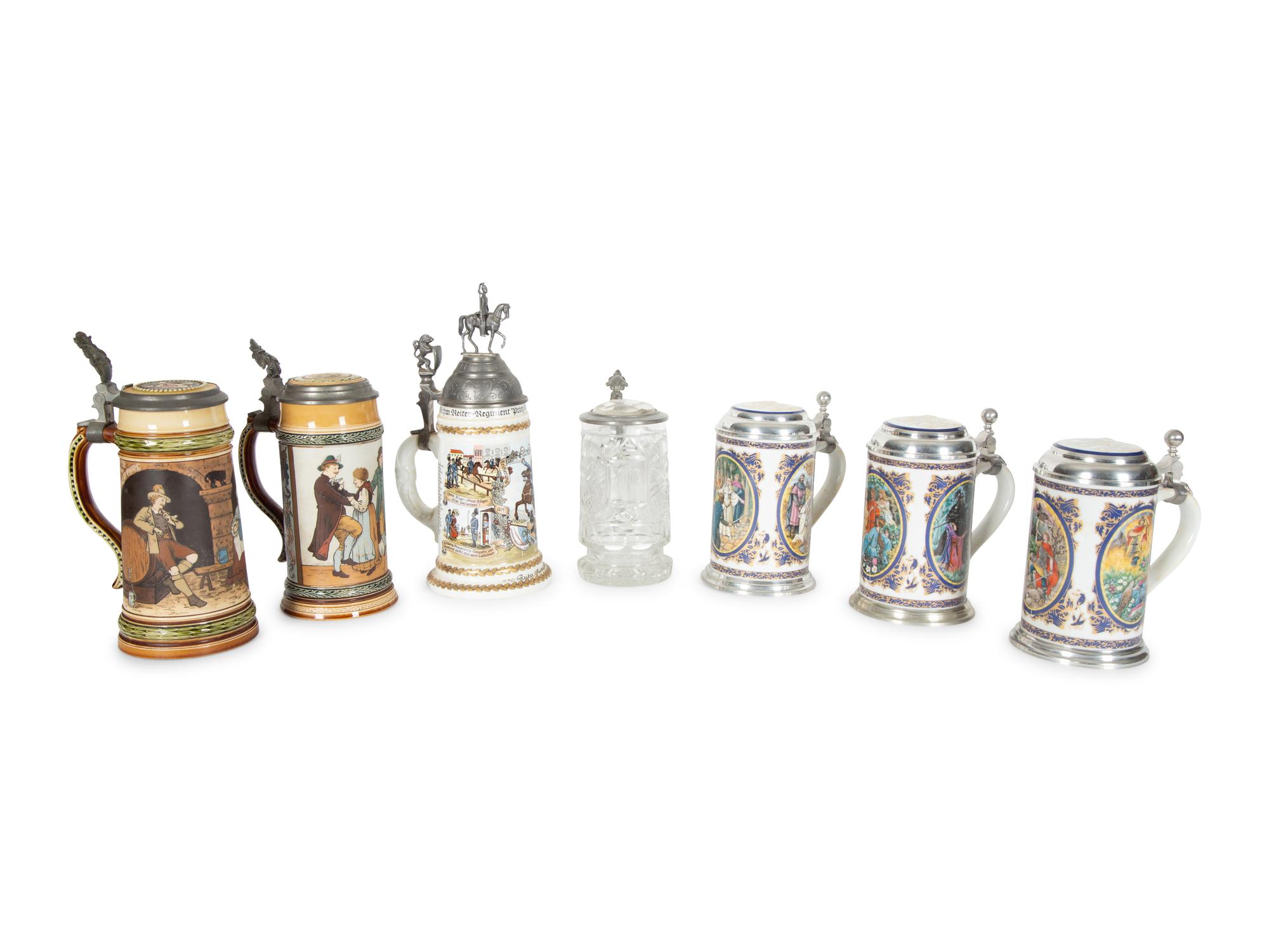 A Collection of German Pewter Mounted Steins
