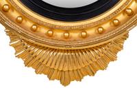 A Regency Style Giltwood Convex Mirror