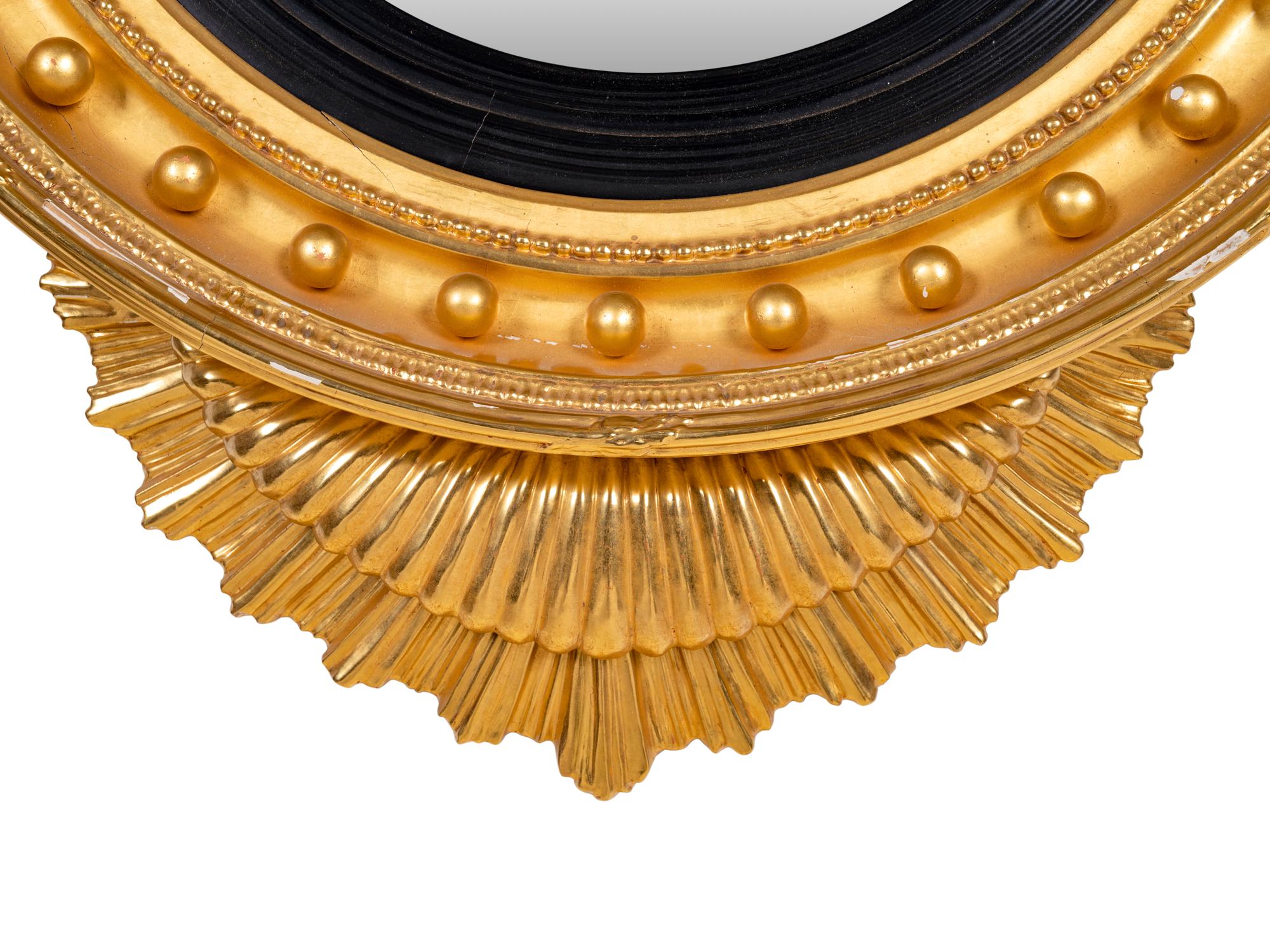 A Regency Style Giltwood Convex Mirror