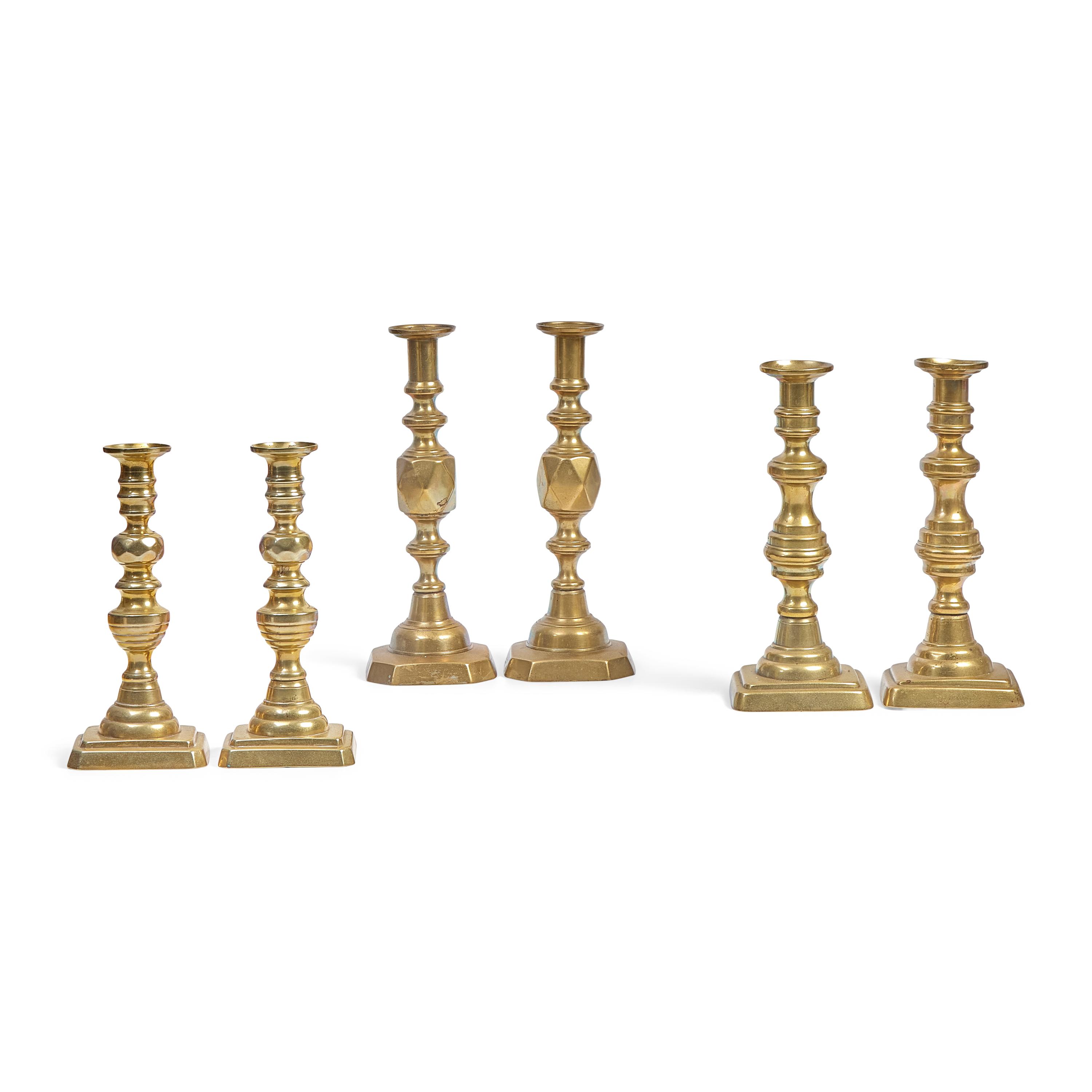 A Group of Six English Brass Candlesticks