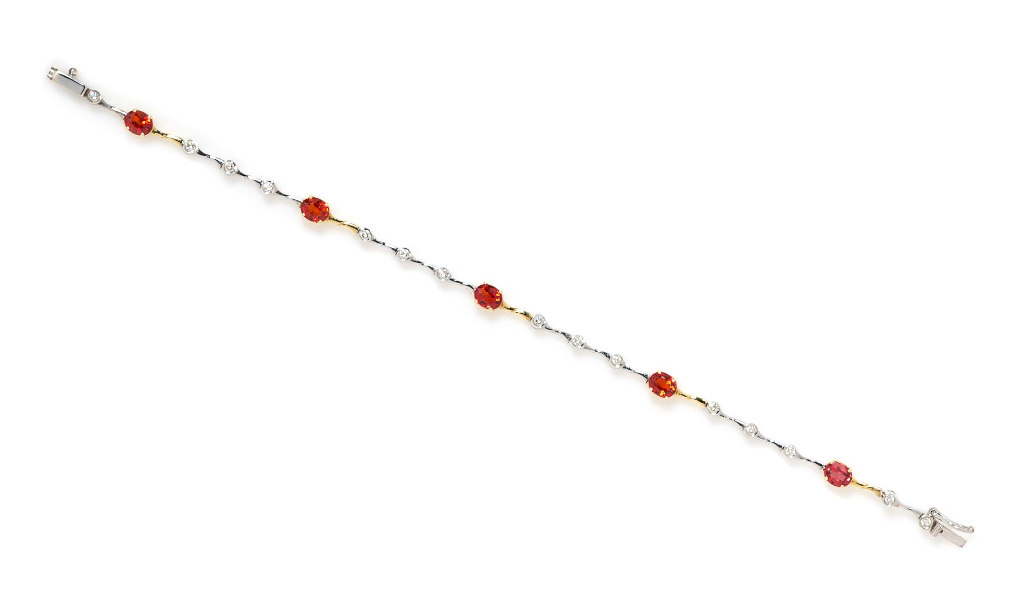 A Bicolor Gold, Spessartine Garnet and Diamond Line Bracelet, 4.40 dwts.