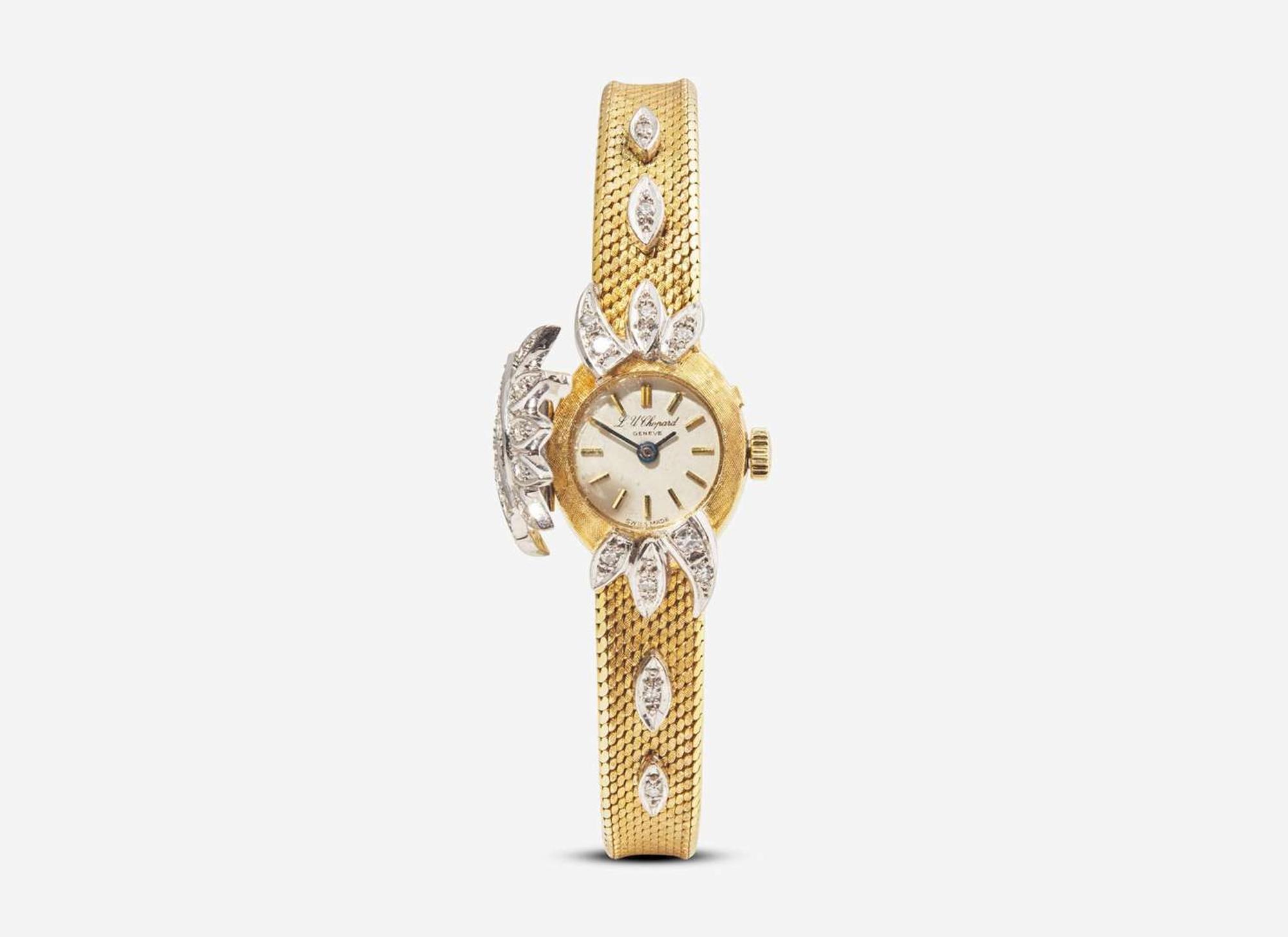 An 18K Yellow Gold and Diamond Hidden Dial Ladies Chopard Watch
