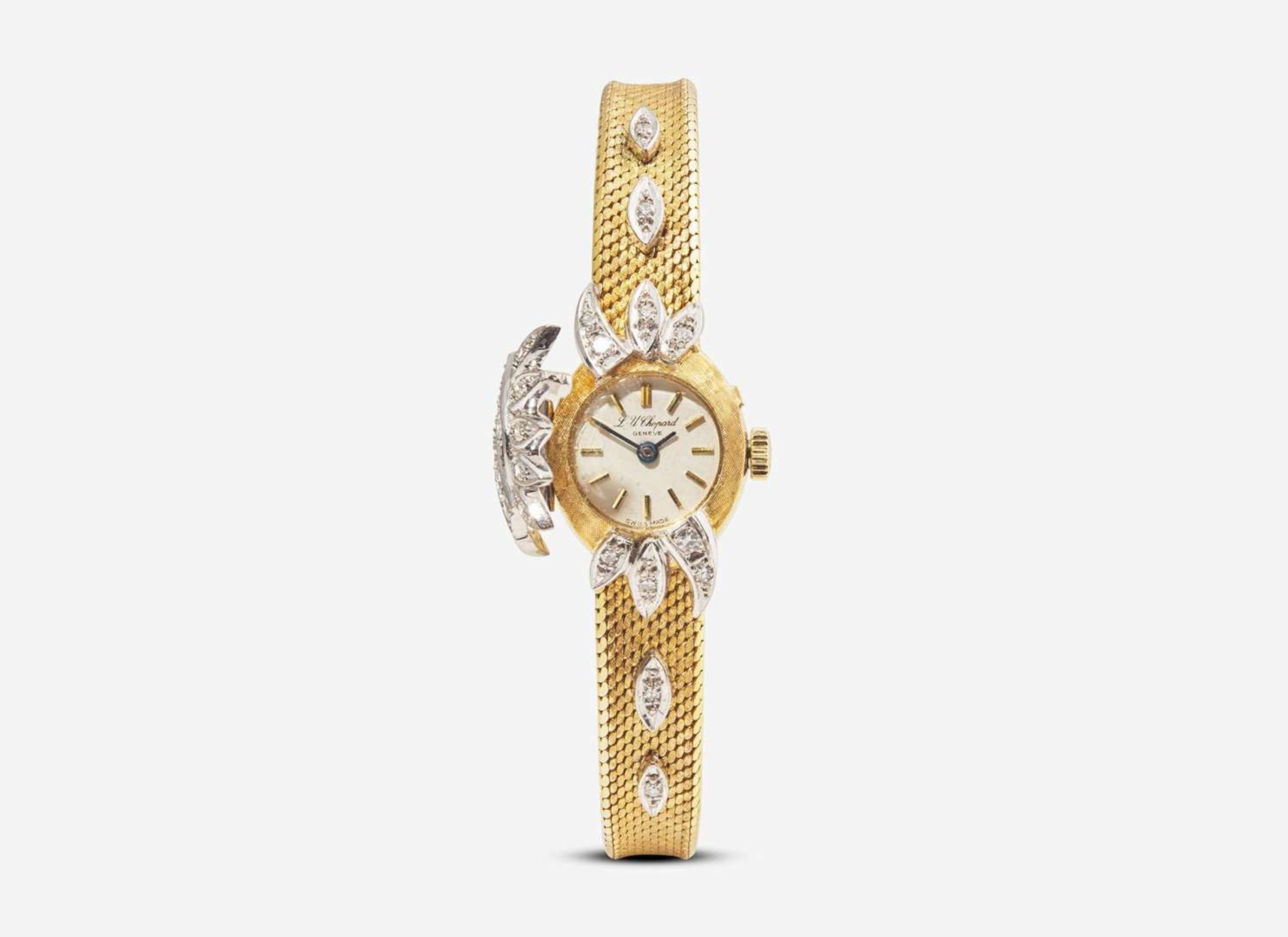 An 18K Yellow Gold and Diamond Hidden Dial Ladies Chopard Watch