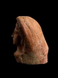 An Etruscan Terracotta Votive Head of a Woman