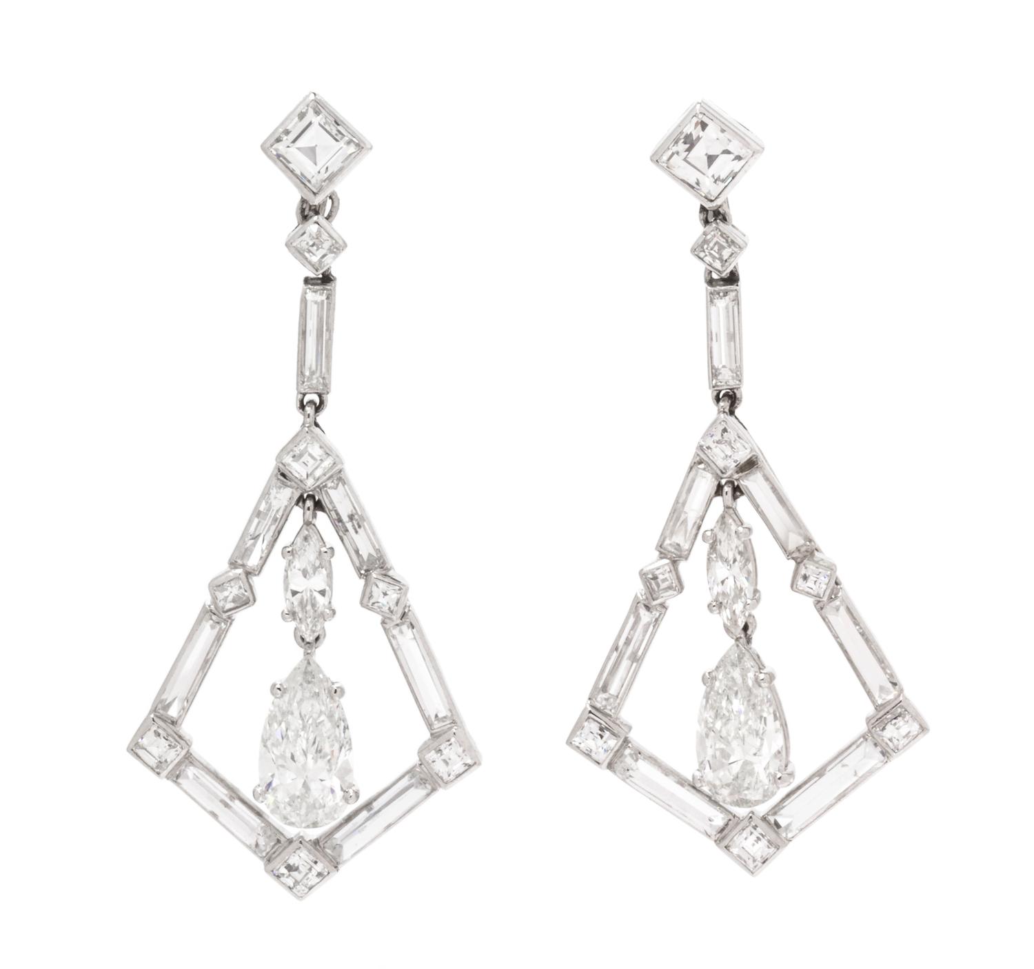 A Pair of Platinum and Diamond Dangle Earrings, 5.50 dwts.