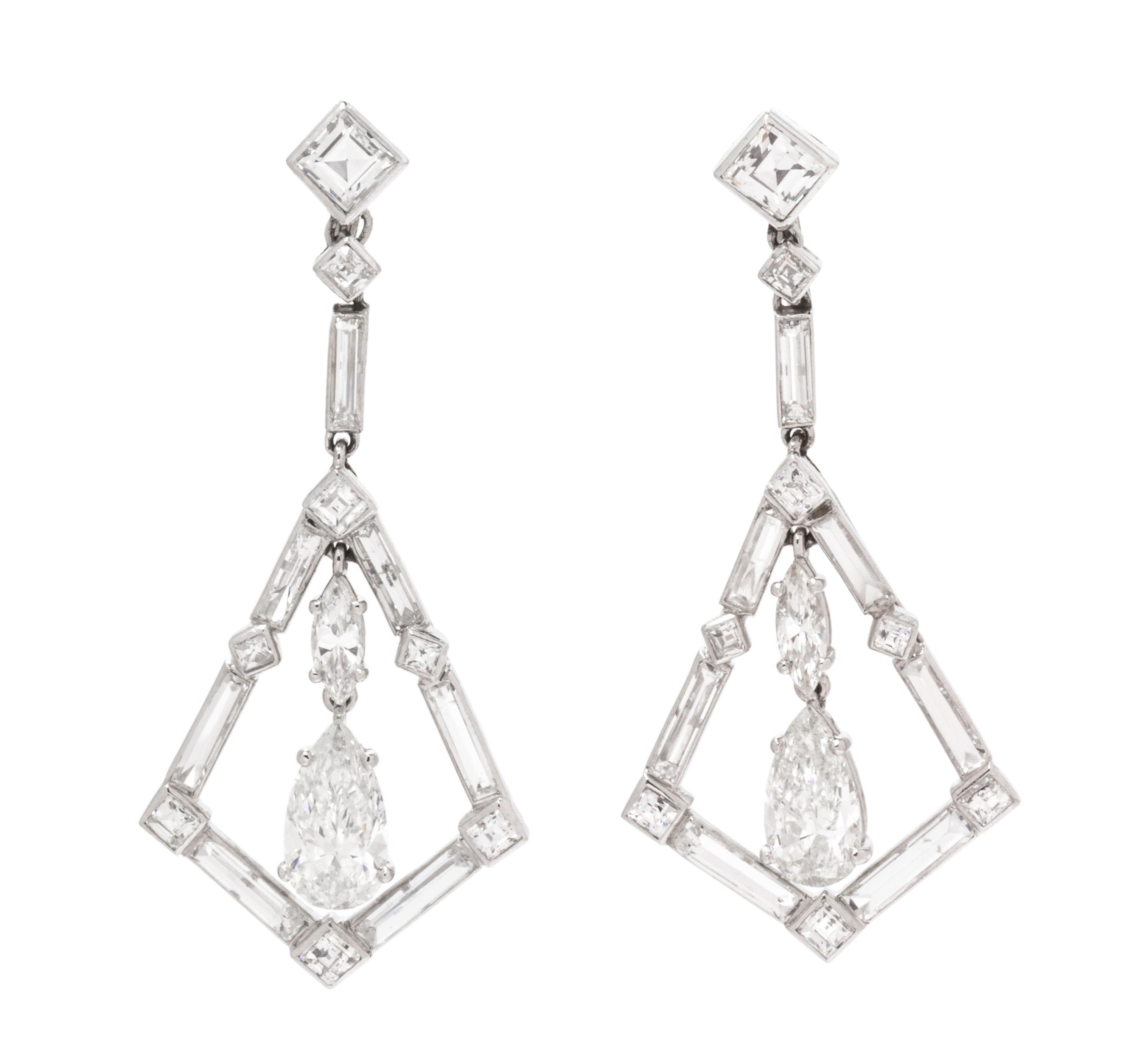 A Pair of Platinum and Diamond Dangle Earrings, 5.50 dwts.