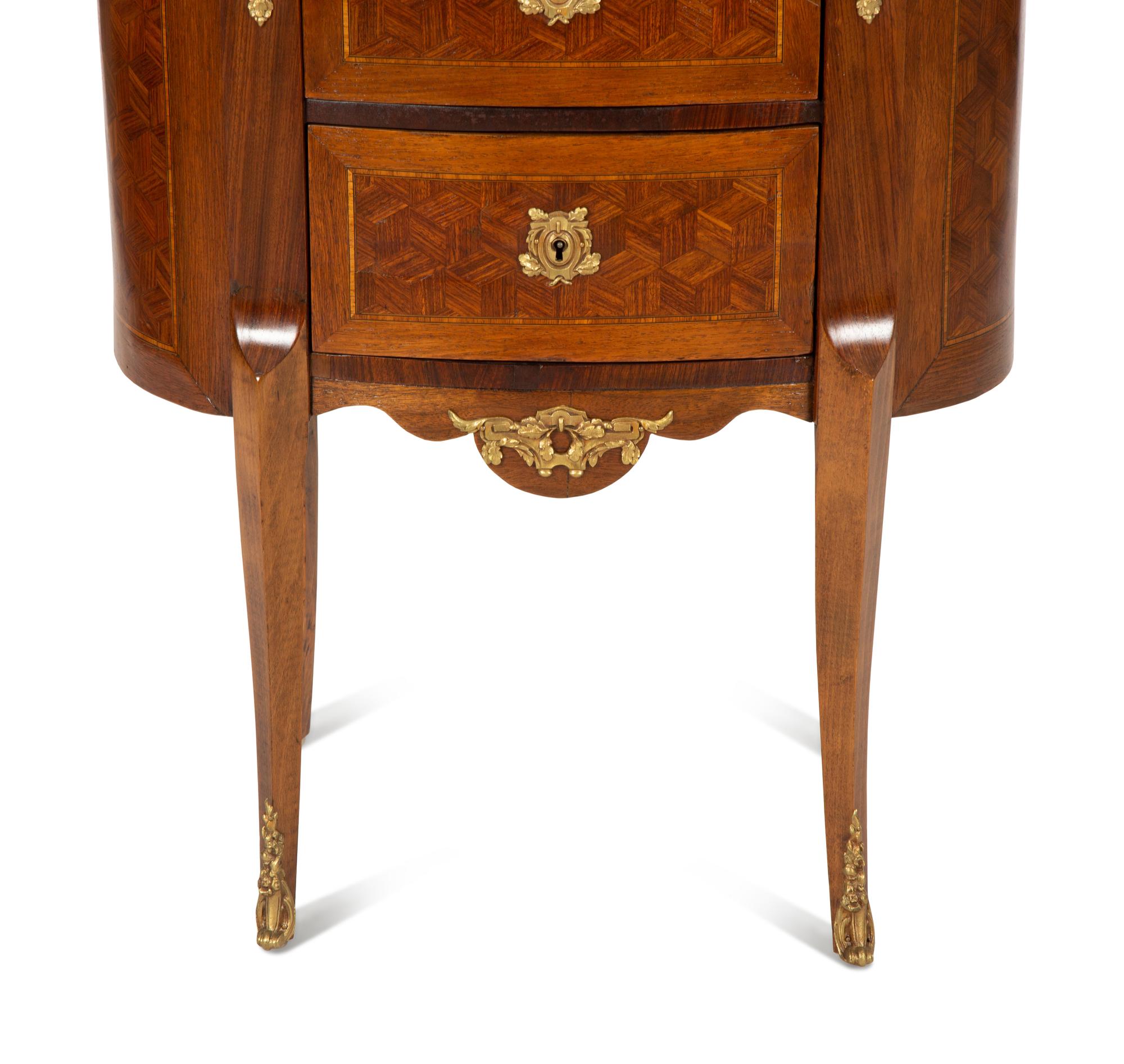 A Louis XVI Style Brass Mounted Parquetry Chiffonier