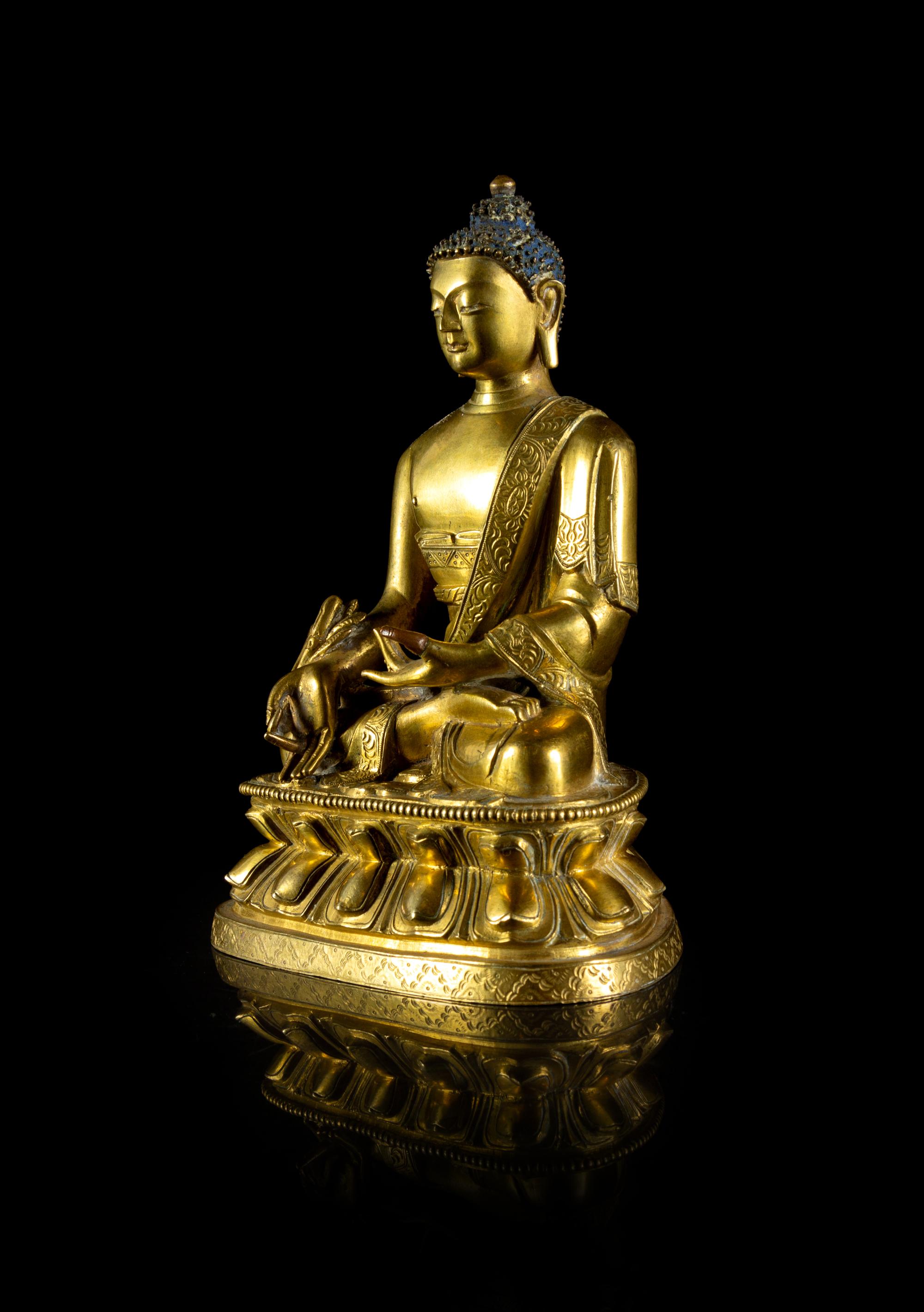 A Sino-Tibetan Gilt Bronze Figure of Sakyamuni Buddha