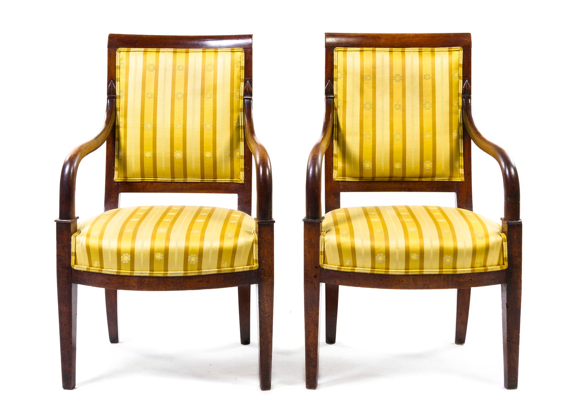 A Pair of Empire Style Walnut Bergeres, Height 35 3/4 inches.