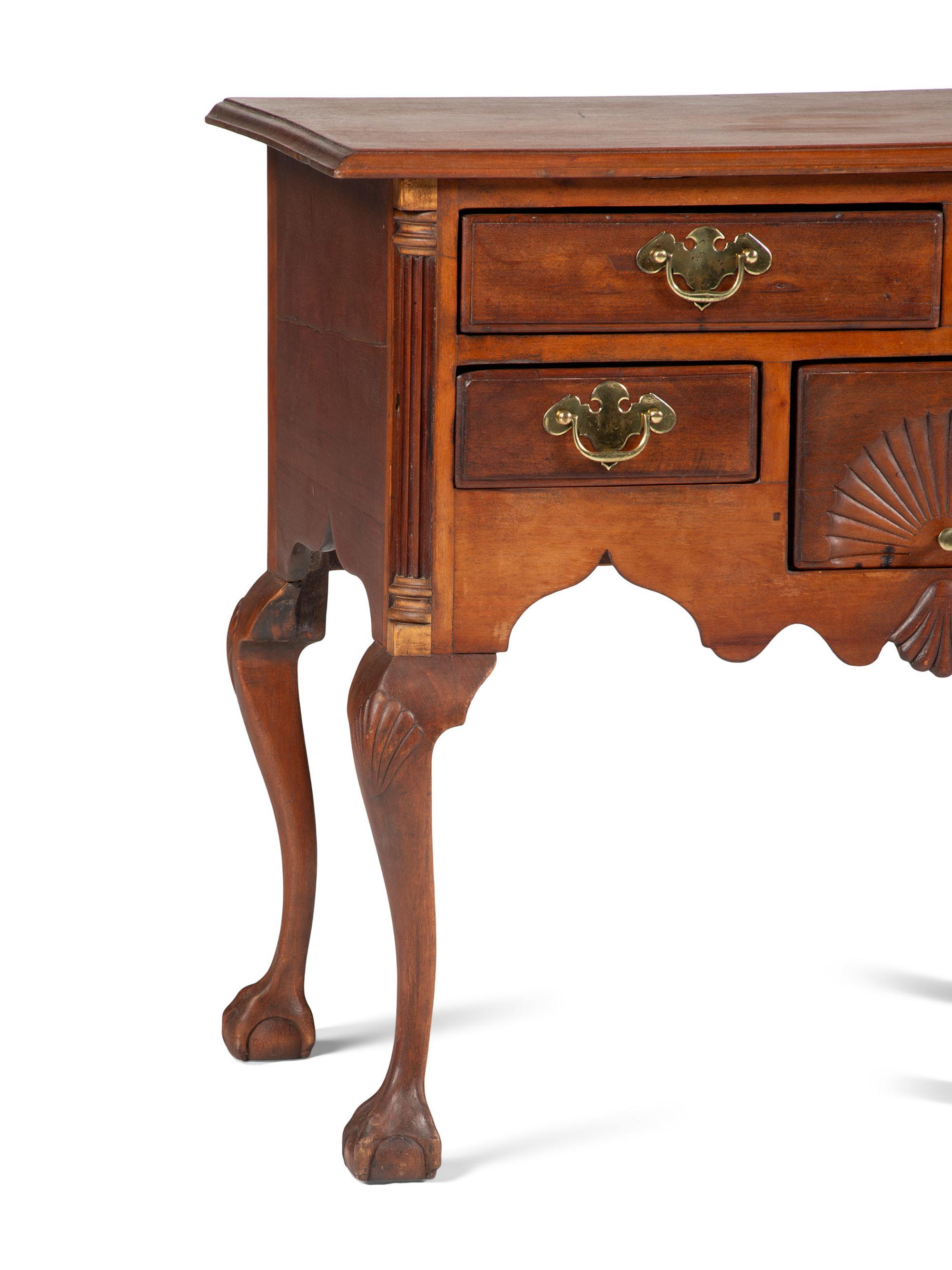 A Chippendale Shell and Fan Carved Cherrywood Ball and Claw Foot Dressing Table