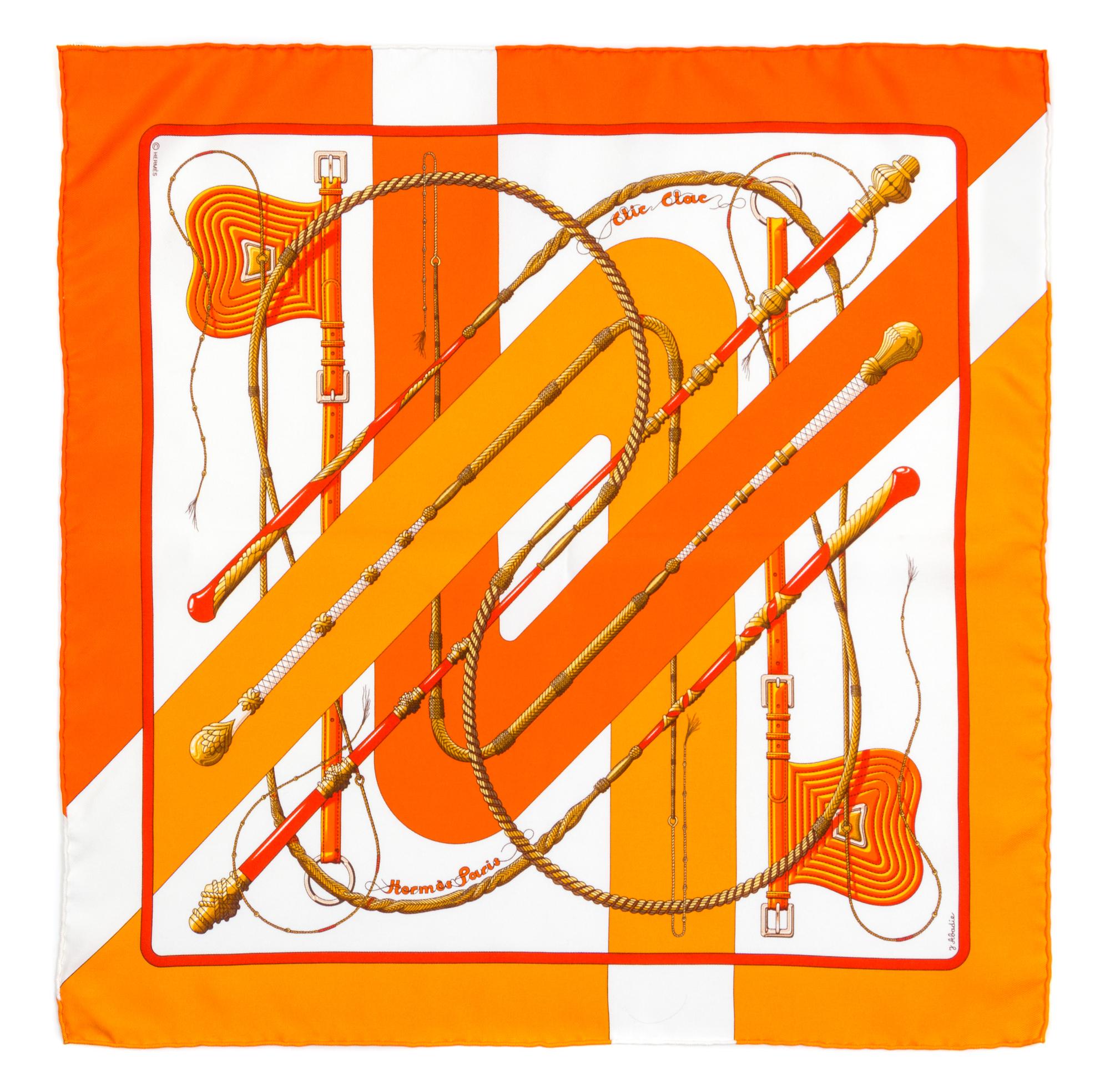 A Pair of Hermes Silk Pocket Squares, 16" x 16".