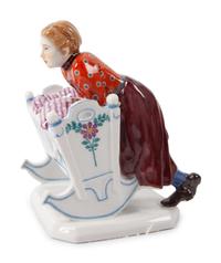 A Meissen Porcelain Figural Group of a Woman with Cradle