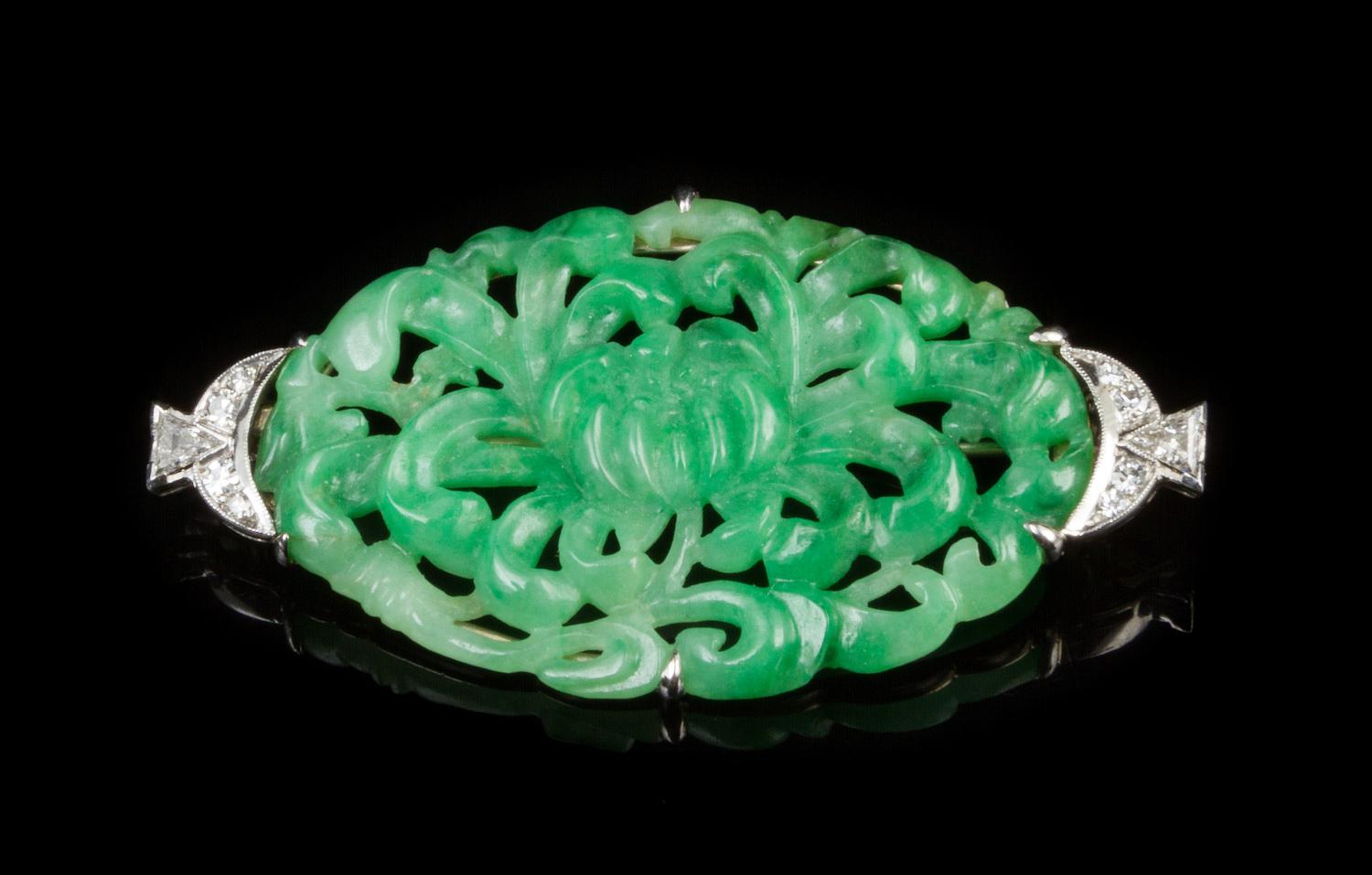 A Jadeite, White Gold and Diamond Brooch CIRCA 1920 Width 2 inches. — CIRCA 1920