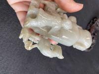 A Chinese jade "Boys, Kylin and Phoenix" vase on carved wood stand 玉雕童子凤鸟花樽及底座