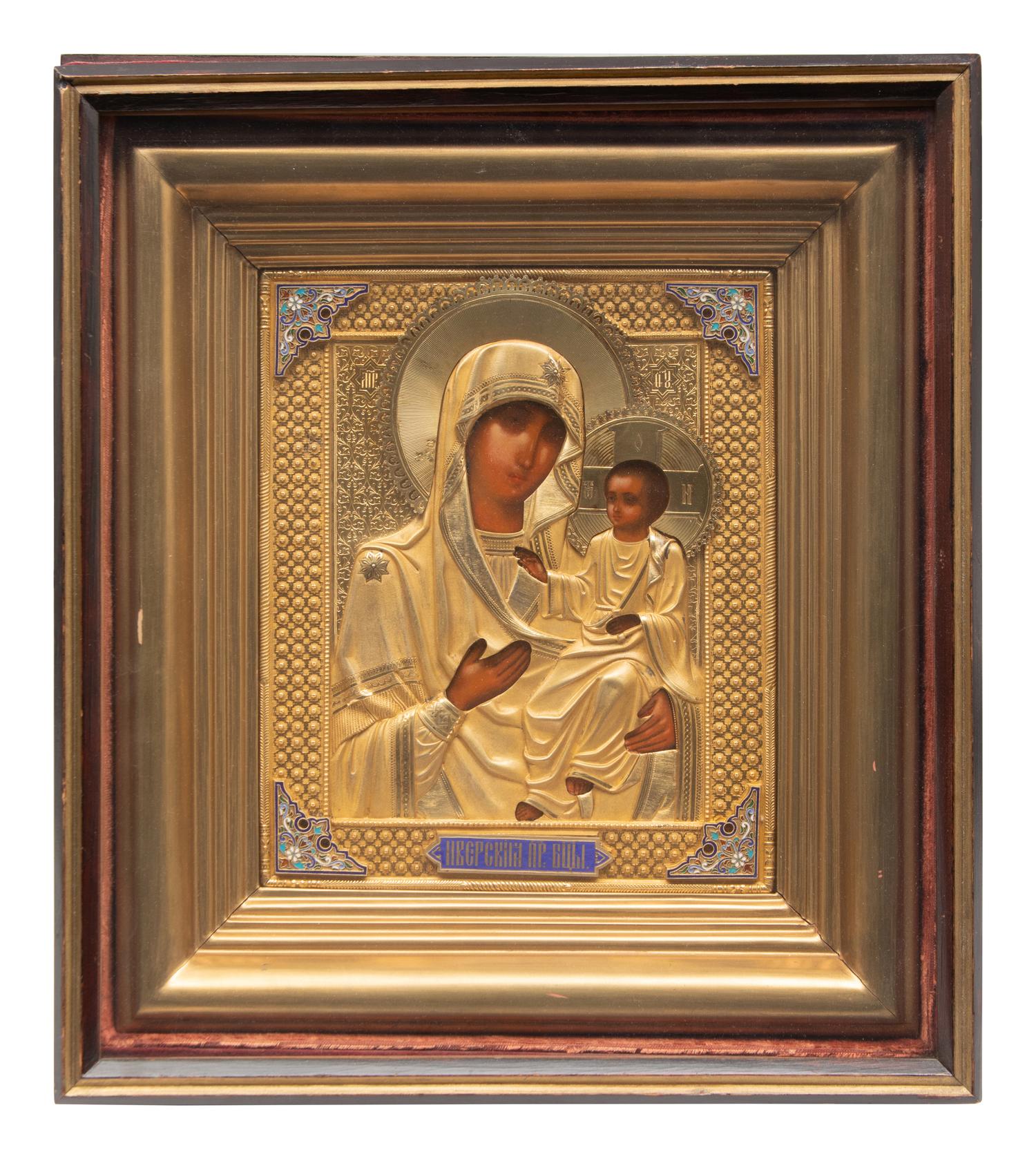A Group of Three Russian Enameled Oklad Icons