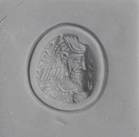 A Sasanian Amethyst Ring Stone with a Royal Portrait and Pahlavi Inscription — Set in a gold ring