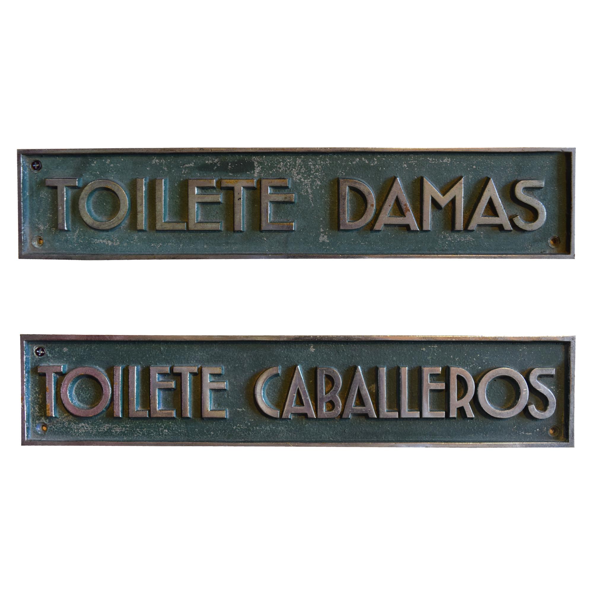 A Pair of Cast Brass and Chrome Toilete Signs 15.5" W x 3" H — Argentina, Early 20th Century