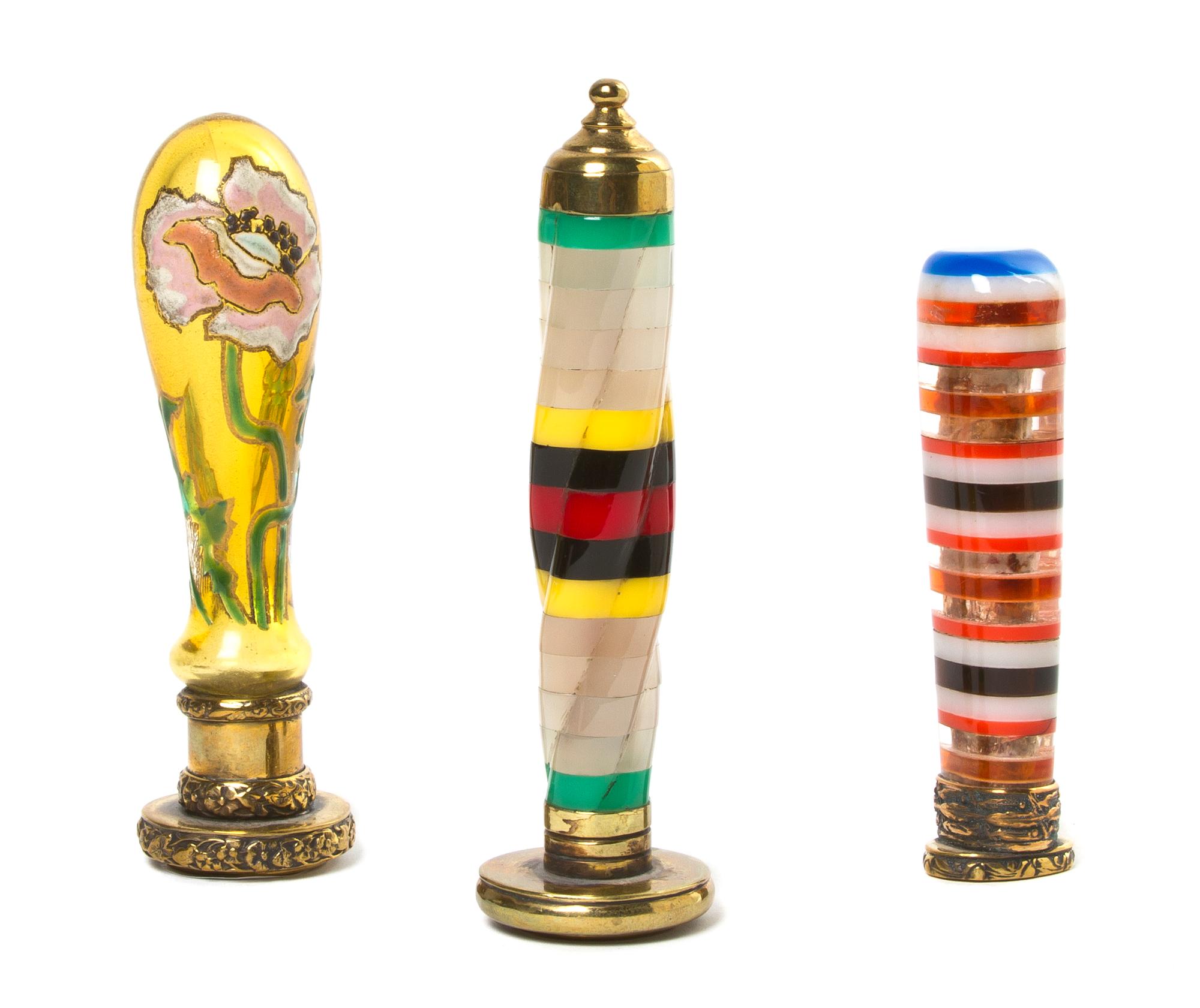 A Collection of Three Seals, Height of first 4 7/8 inches.