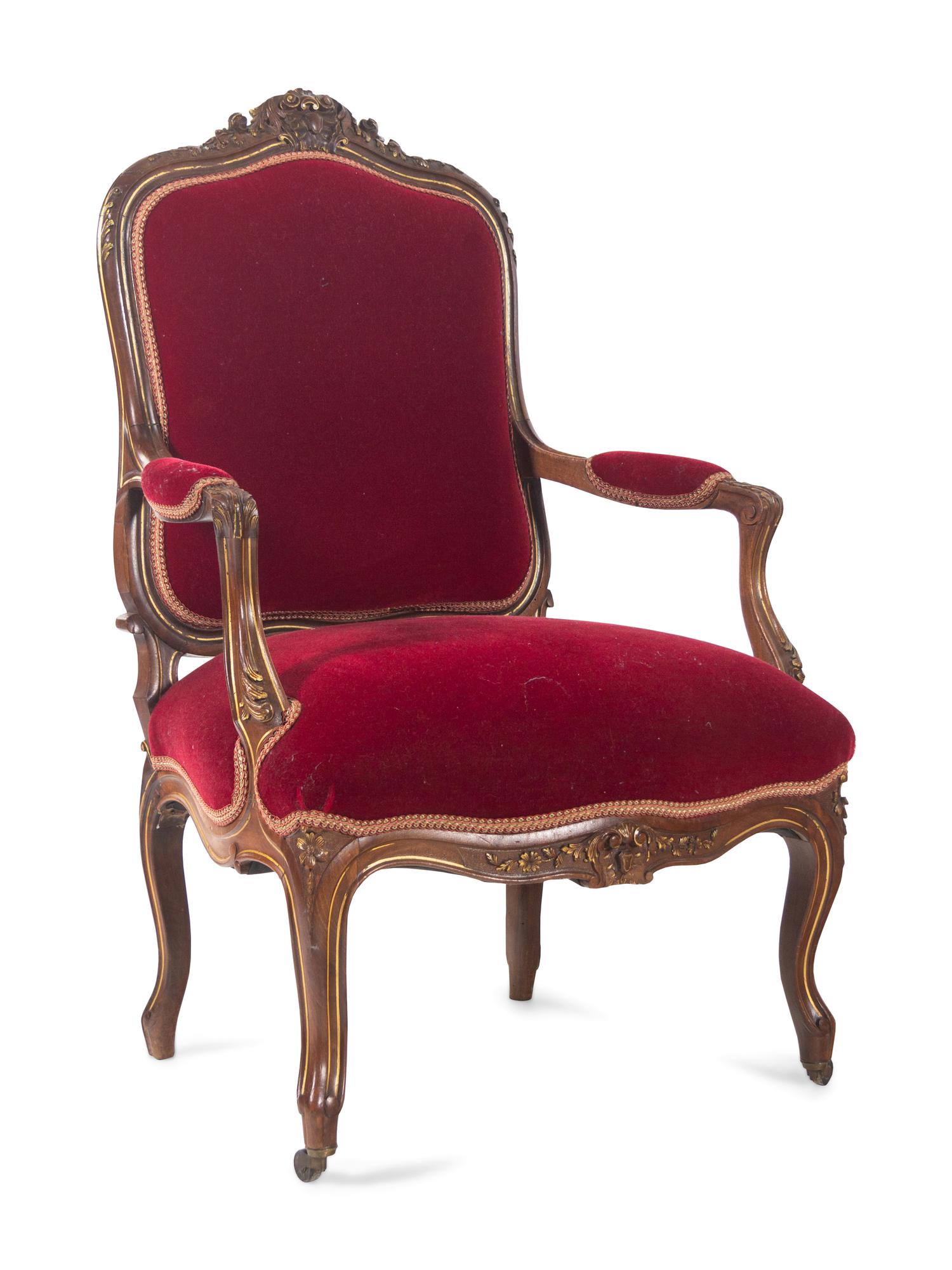 An Italian Louis XV Style Carved and Parcel Gilt Walnut Parlor Suite